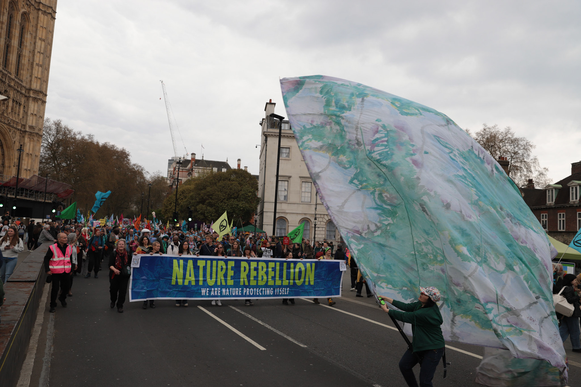 People participate in 'The Big One' protest and march organized by Extinction Rebellion in Central London, Britain, April 22, 2023.