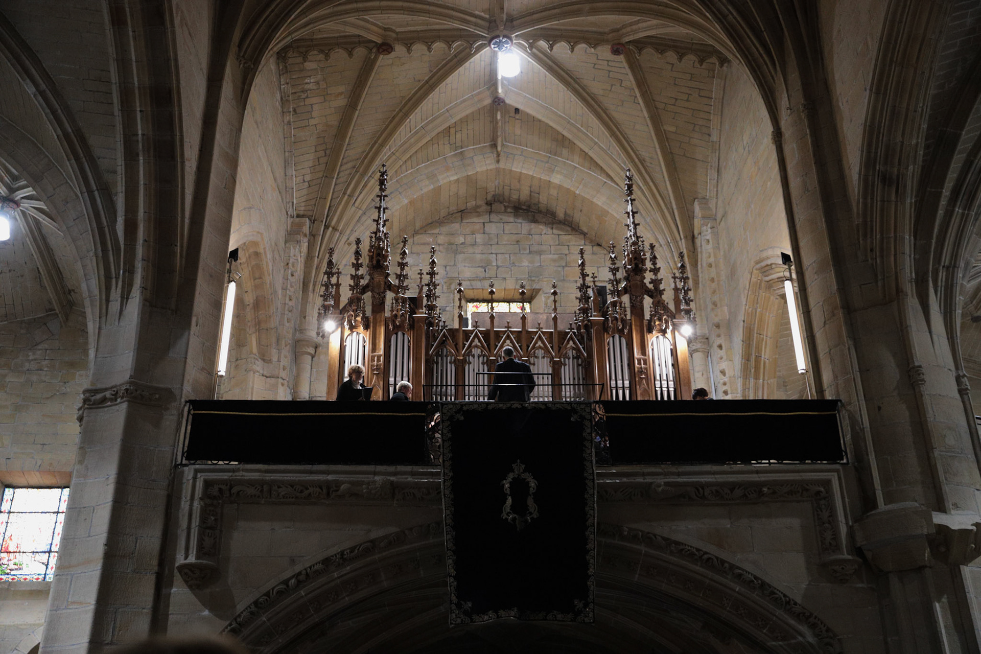 People watch as the passages from the Silent Procession and Holy Sepulchre of the Recumbent Christ are brought back for burial at the Santa Maria de la Asuncion y del Manzano Church in Hondarribia, Gipuzkoa, Basque Country, Spain, April 08, 2023.