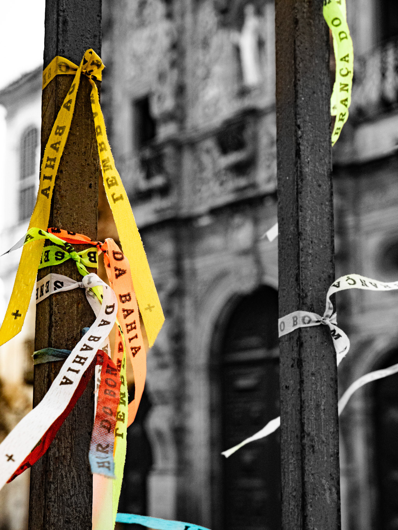 03.02.2025 Salvador de Bahia in Brazil. Brazilian Good Luck Wish Bracelets from Salvador de Bahia on the entrance gate of the San Francisco Church