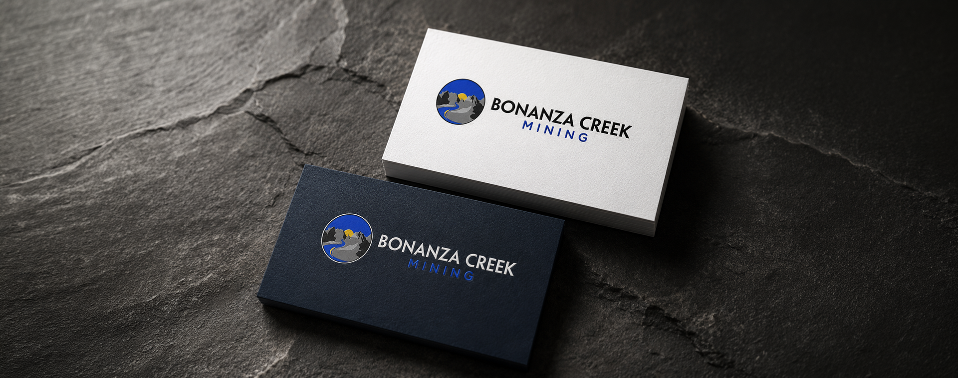 Bonanza Creek Mining brand identity applied to premium white and navy business cards.