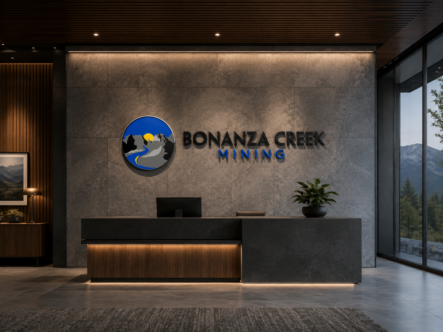 Bonanza Creek Mining logo installed behind a contemporary reception desk with stone and wood finishes.