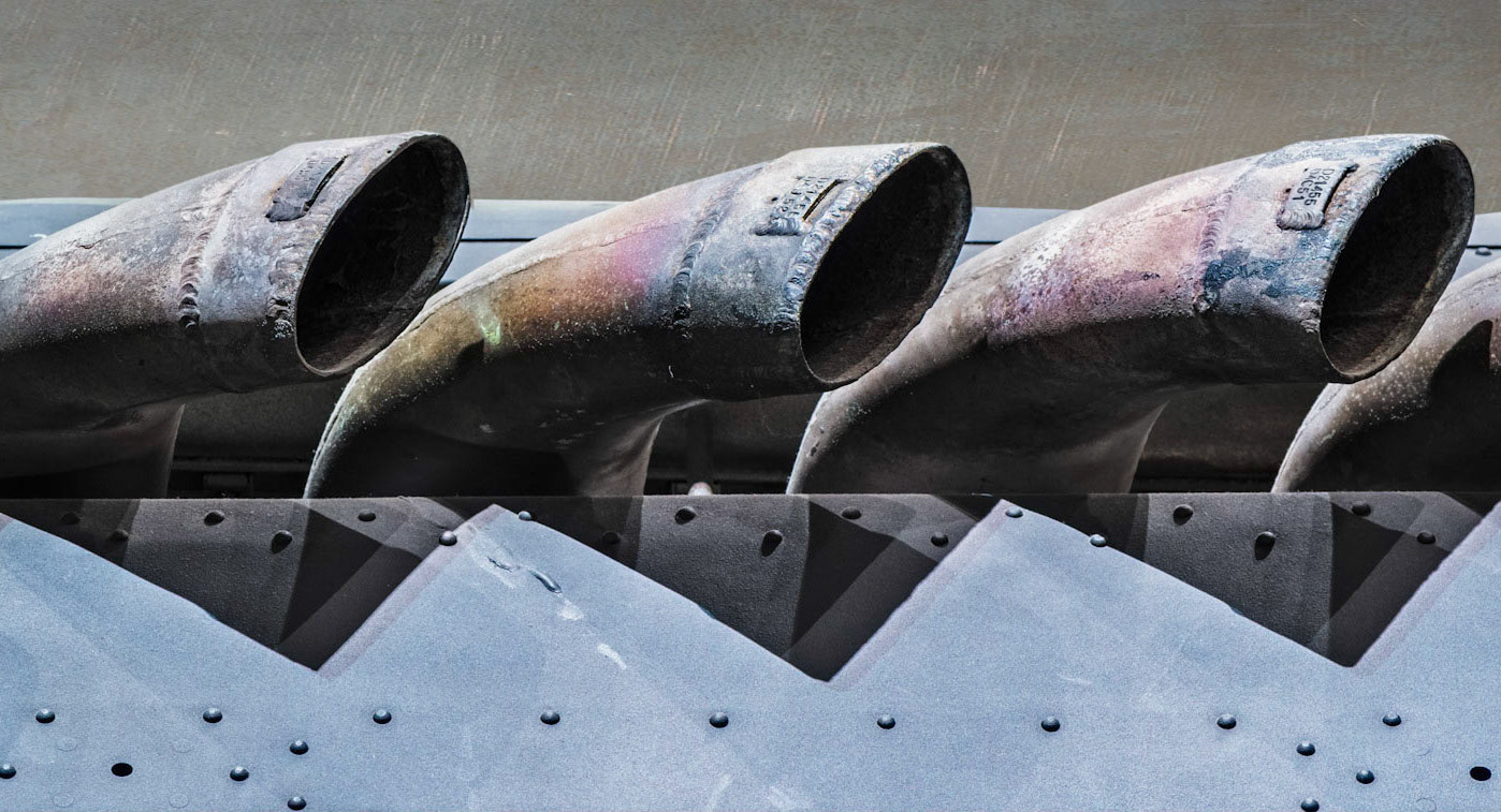 This is only one small part of a complete Lancaster bomber at the museum. The discolouring of the metal and the triangular shapes formed by the shadows are what caught my eye.