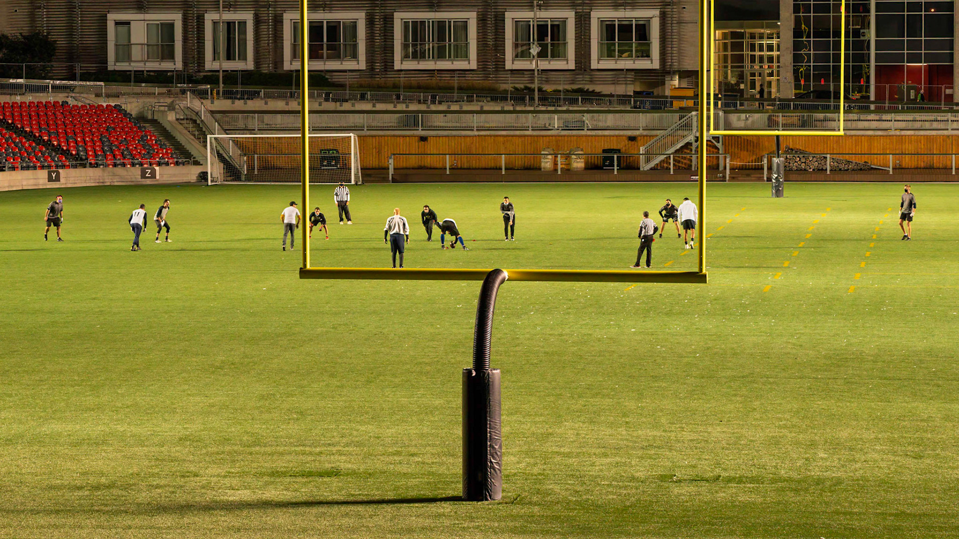 Play underway at TD Place Stadium. [ISO 6400, 105 mm, f/8.0, 1/100s]