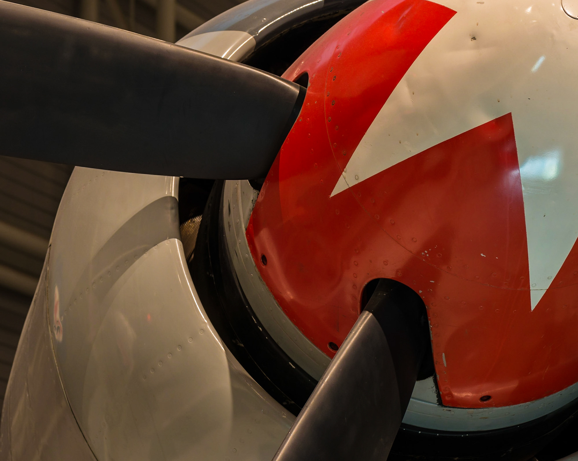 The bold red colour grabs the eye here and is supported by leading lines from the propellers.