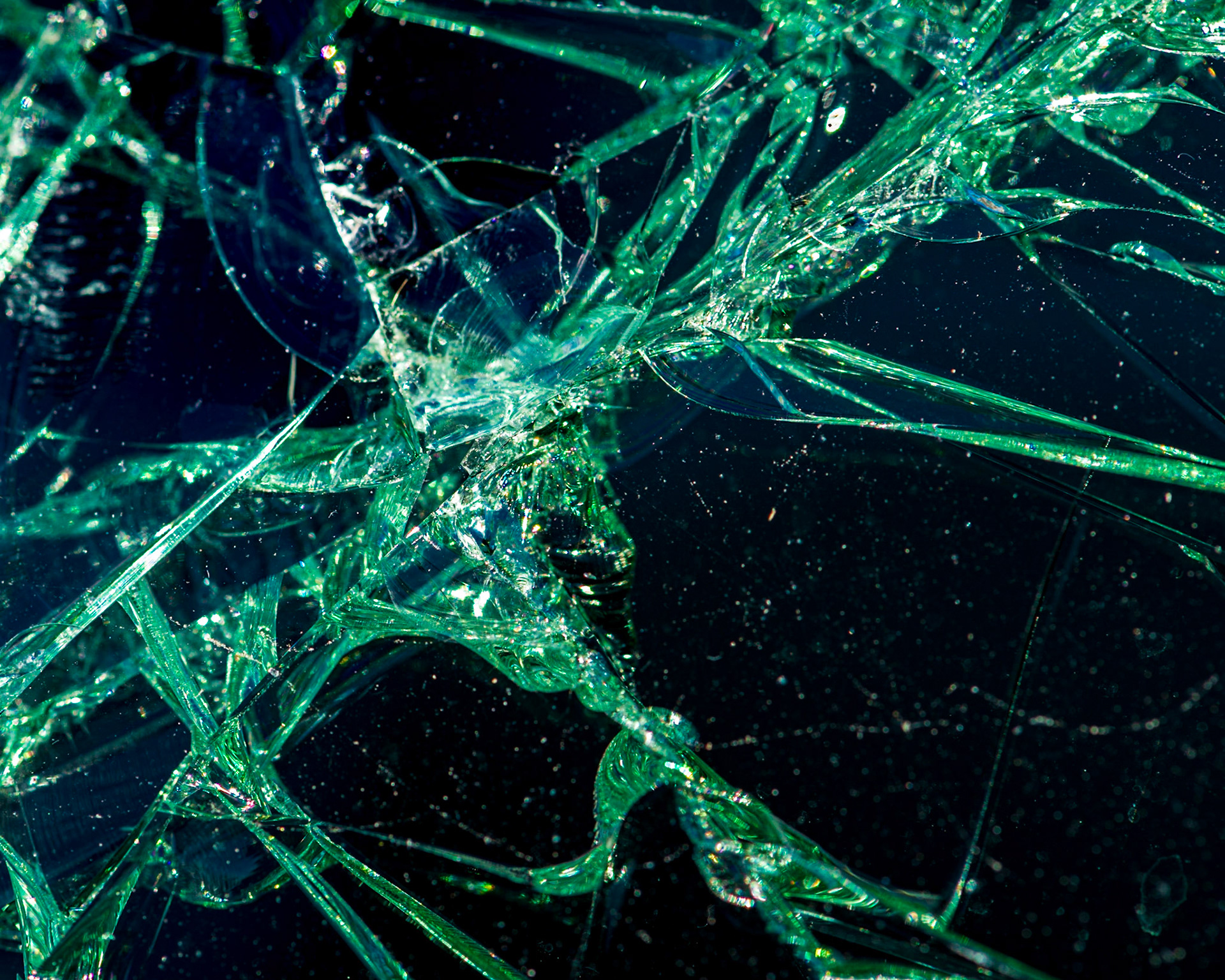 I had so much fun photographing broken glass! Here the sun illuminates an interesting diagonal shape set against the dark interior of the car.