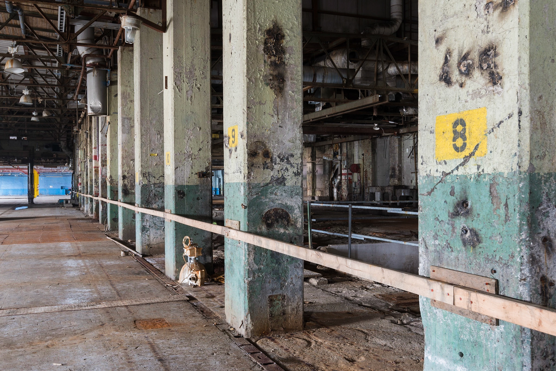 Once home to large machines, this room is now empty and boarded off to prevent the unwary from falling to the floor below