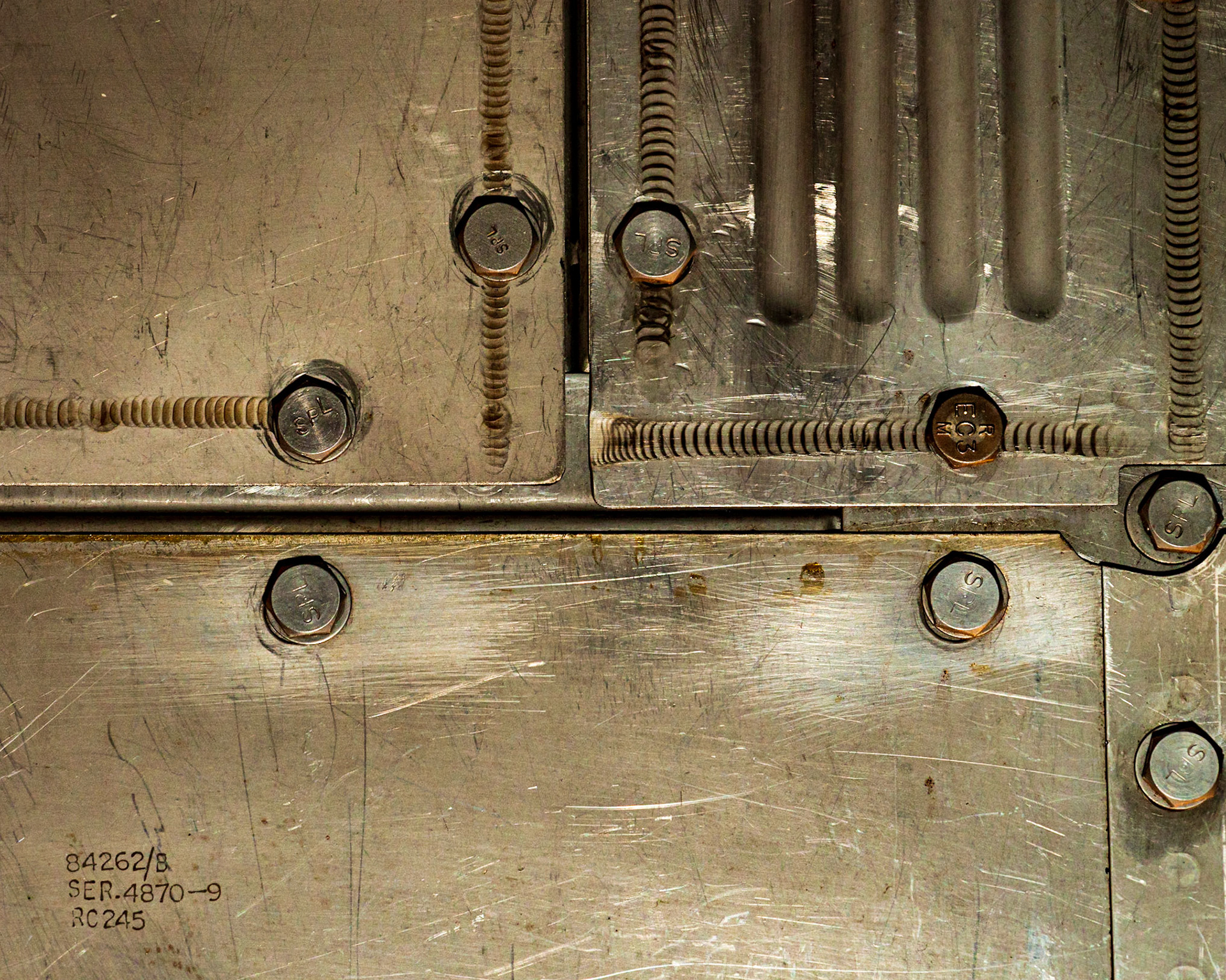 An experiment in composition. Text draws the eye, especially when it’s in a corner of the frame. I’m using the text to balance all the detail in the upper right. Additionally, I find the shapes and textures interesting.