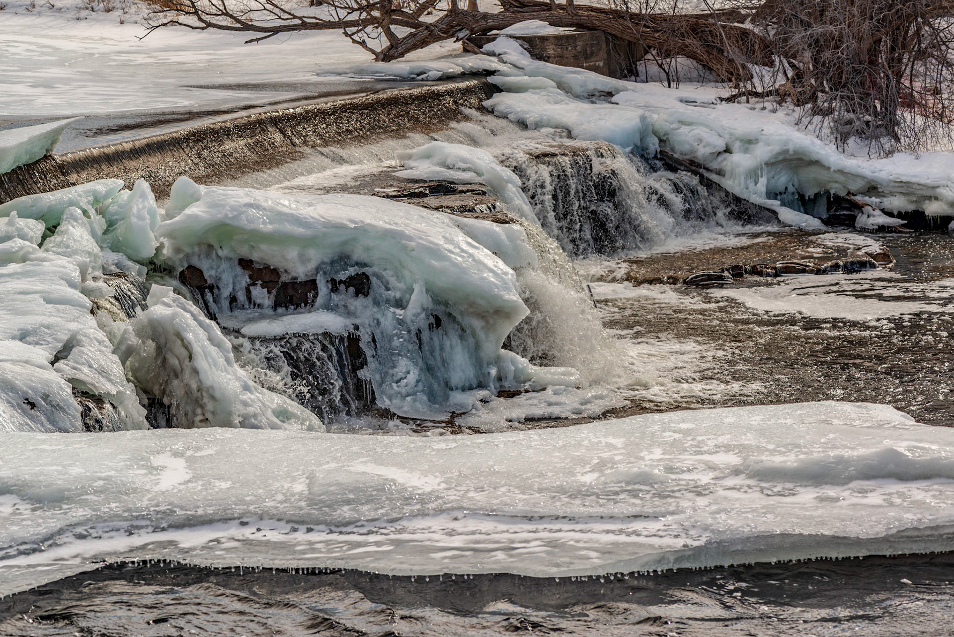 Basically a straight shot of water flowing over the rocks, but framed (and warped a bit) to minimize extraneous detail in the background.