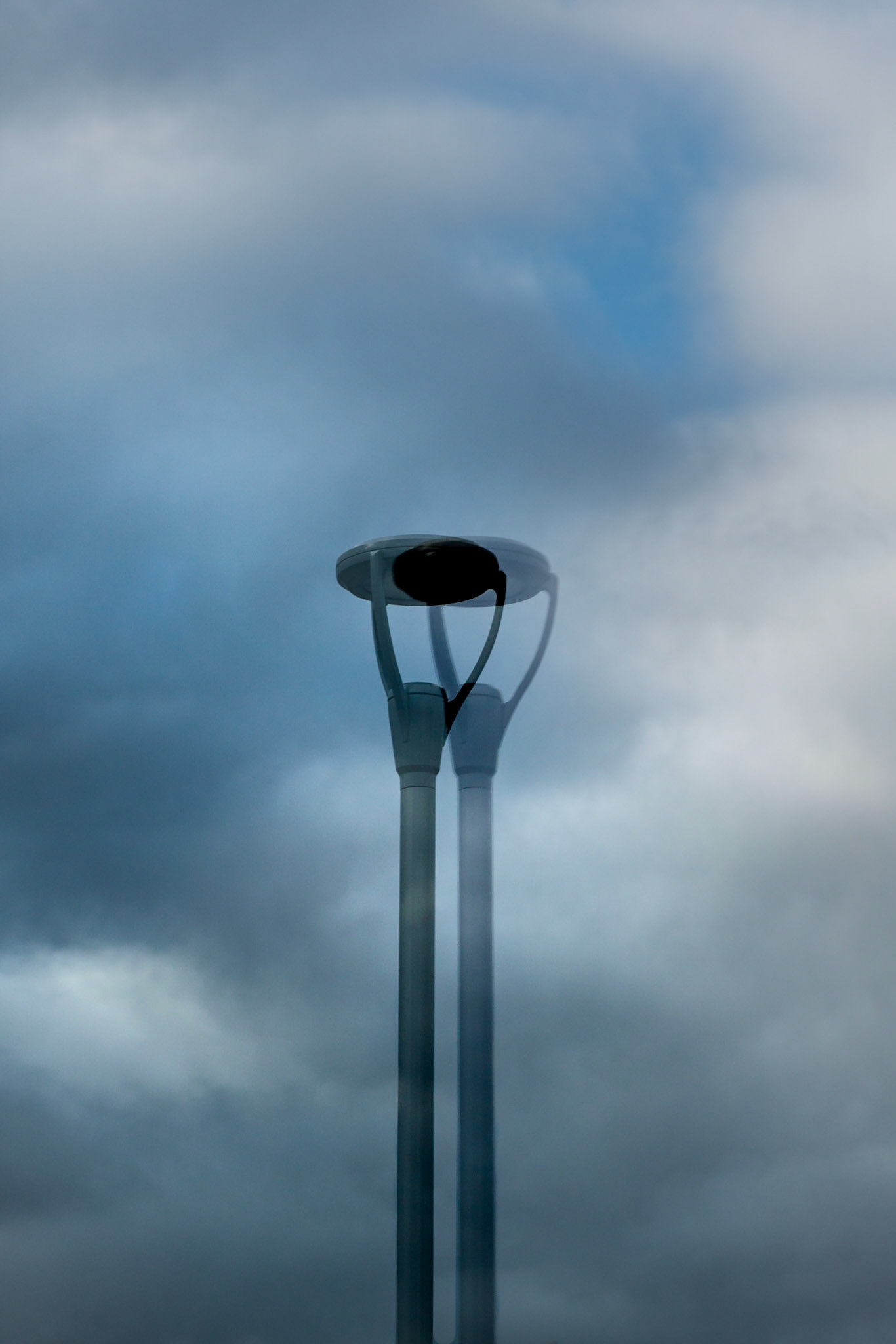 St-Laurent Station. The windows of the station created interesting double reflections of the lighting outside. I’ve made use of that together with the arc of clouds in the background.
