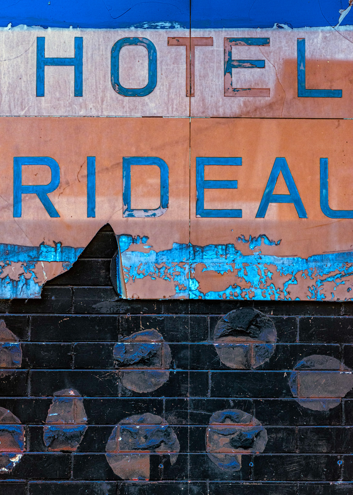 Signage on a run down building in Smith's Falls, Ontario. Lots of character in the old brick wall and the faded lettering.