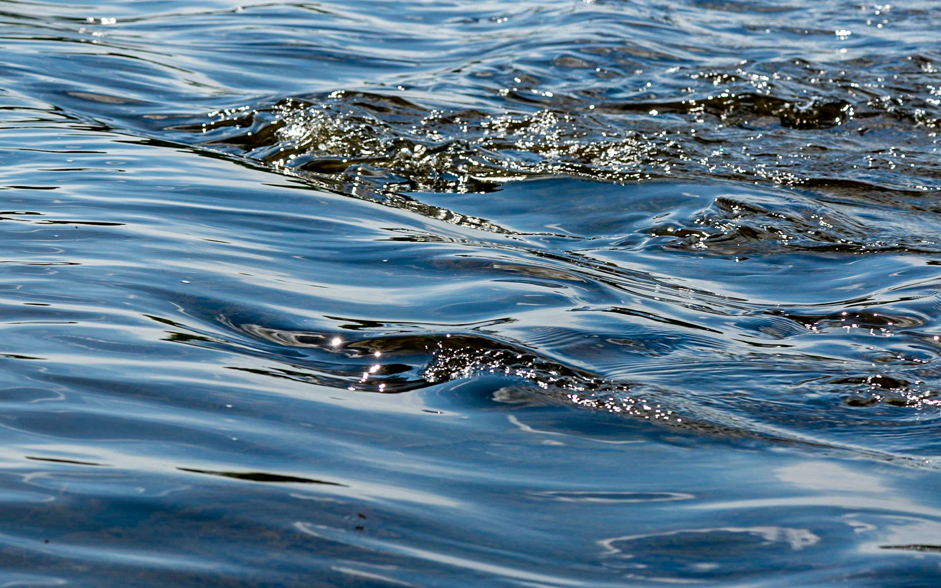 It's only water, but I find the undulating pattern of the flow and sparkles of sunlight beautiful.