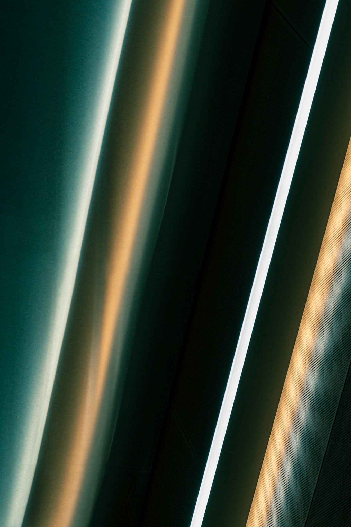 Rideau Station. The colourful lines of the doors to an elevator, with a bit of rotation, led to a very graphic abstract composition. I took many shots of this elevator but find this the strongest one.