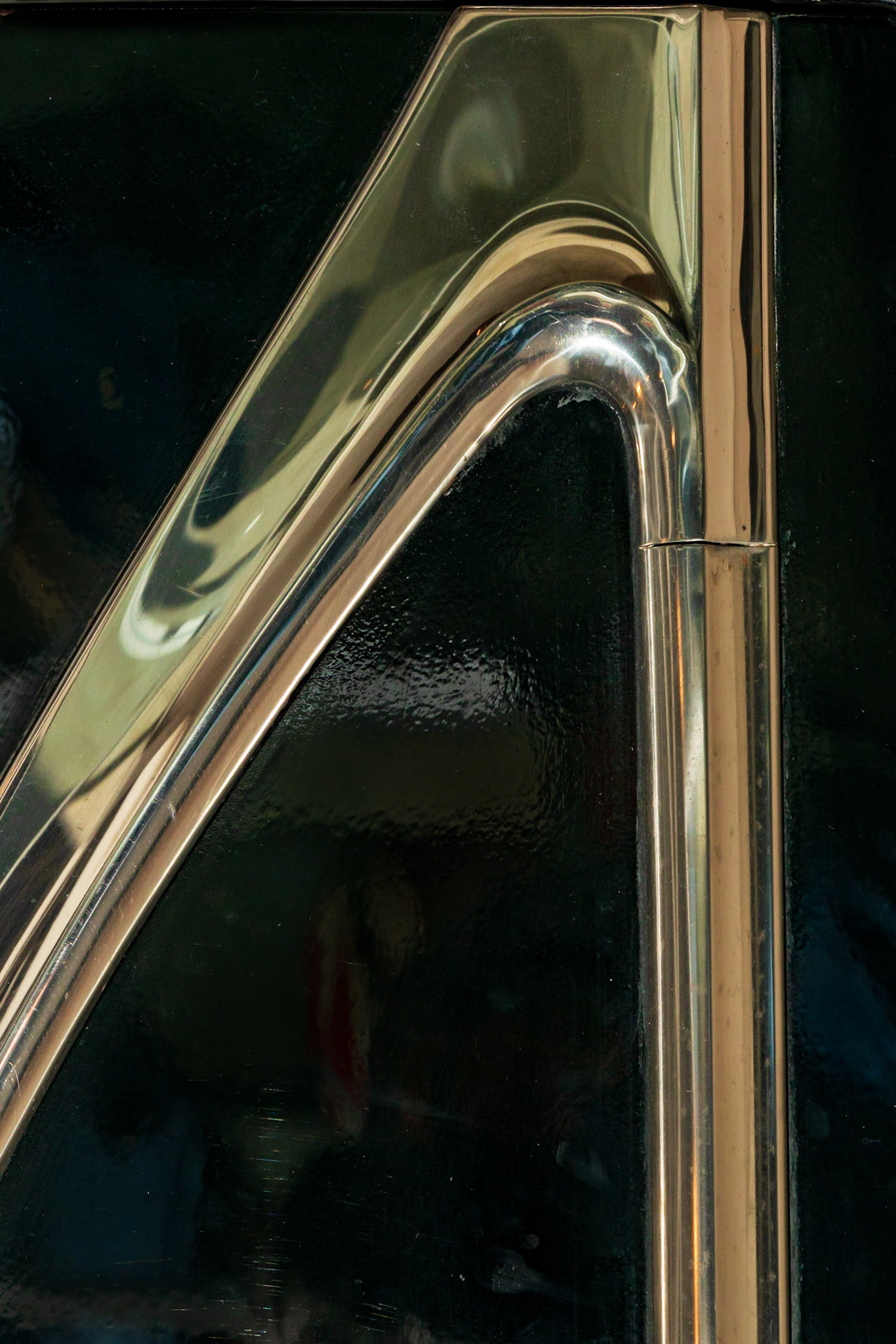The museum had a vintage car on display, and this is a small section of chrome that I found made an interesting graphic image. I’ve rotated it to abstract it and increase its graphic impact.