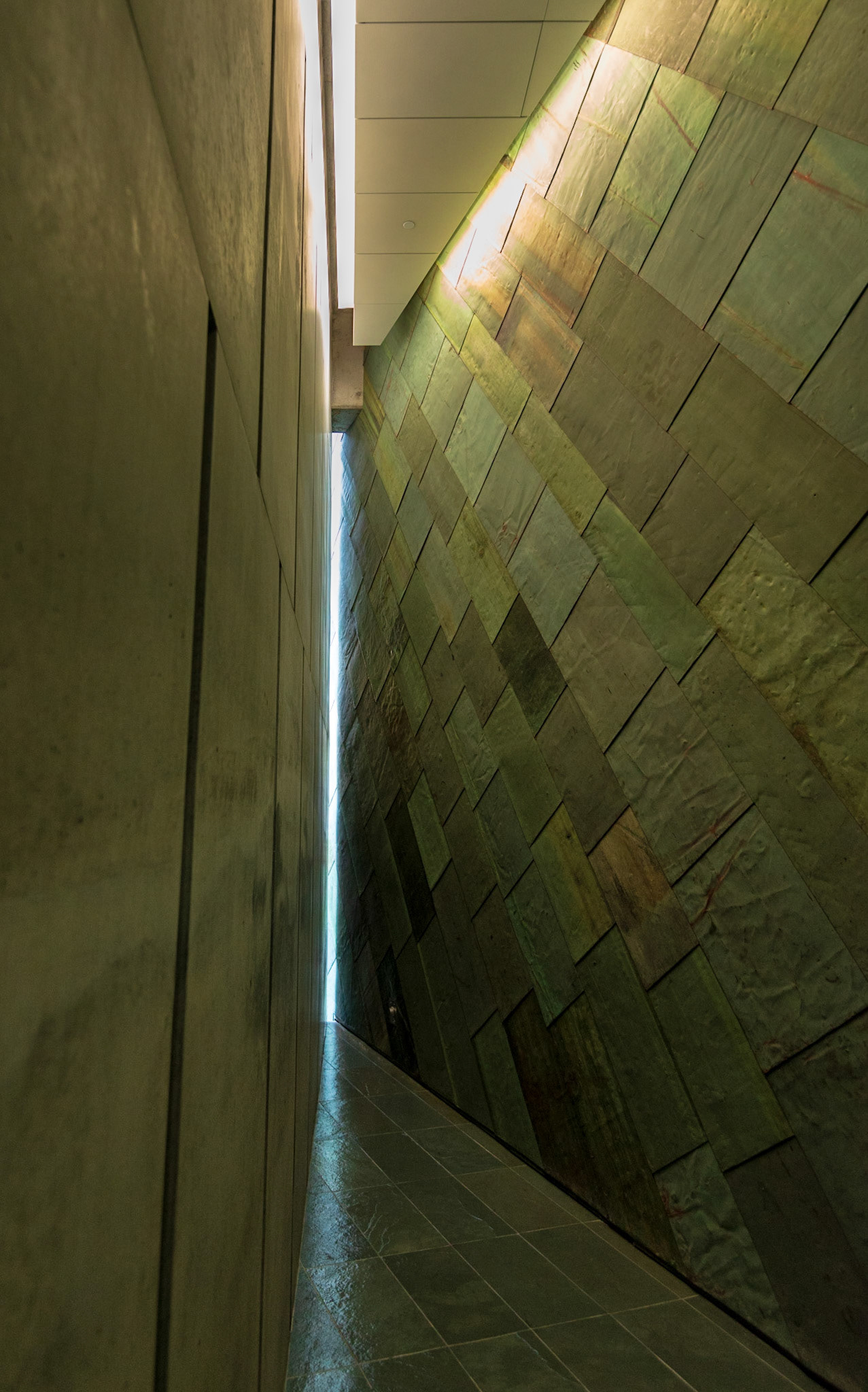 Very similar to the shot taken at the Holocaust Memorial, we have a bright central line connecting triangles at top and bottom.. The texture of the right wall adds further interest.