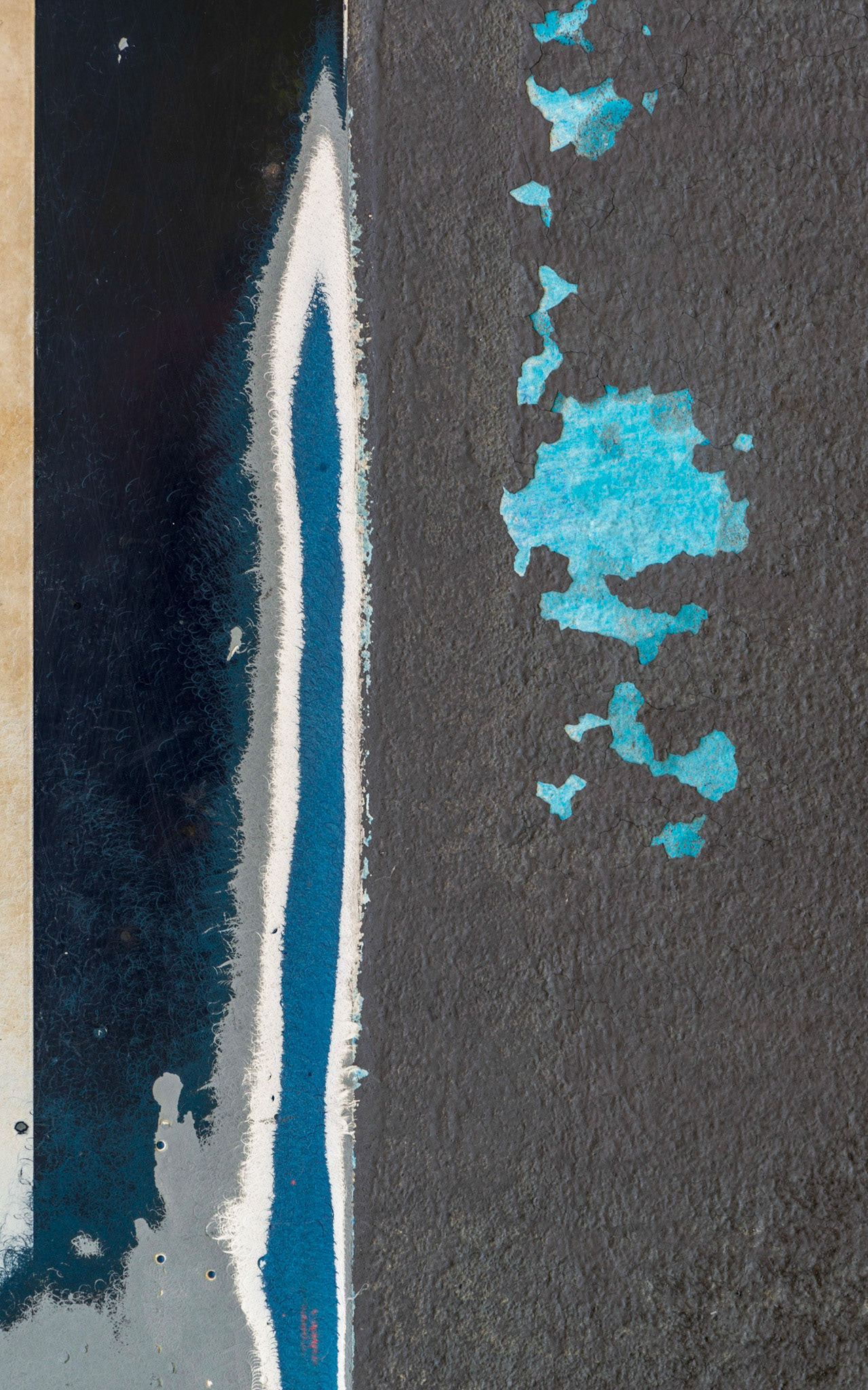 Another boat in need of repair offered up this abstract, where lines of colour on the left are balanced with a strong shape on the right.