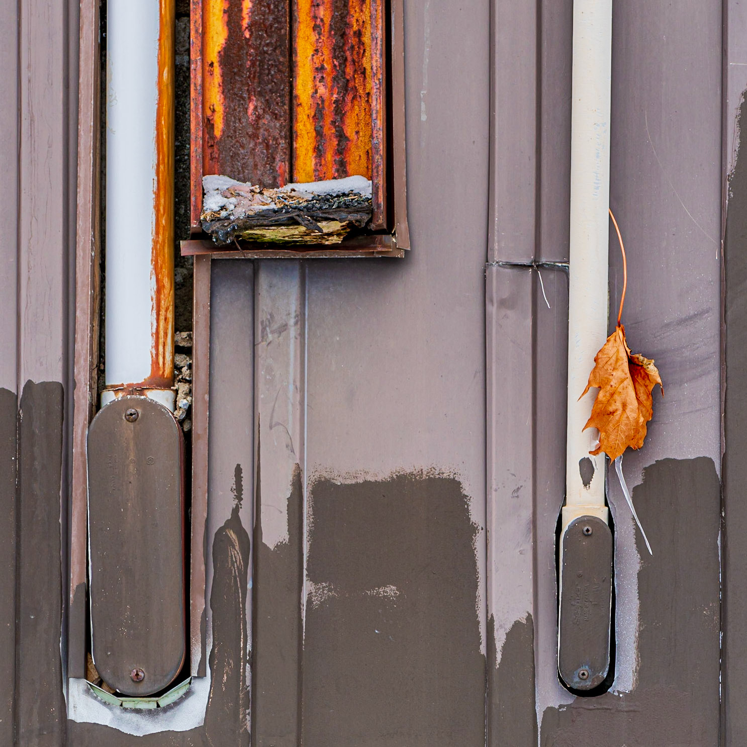 The strong orange elements attracted me to this shot, and I’ve tried to balance them in the frame along with the two strong verticals formed by the conduits. The darker paint at the bottom also helps to balance the strong orange above.