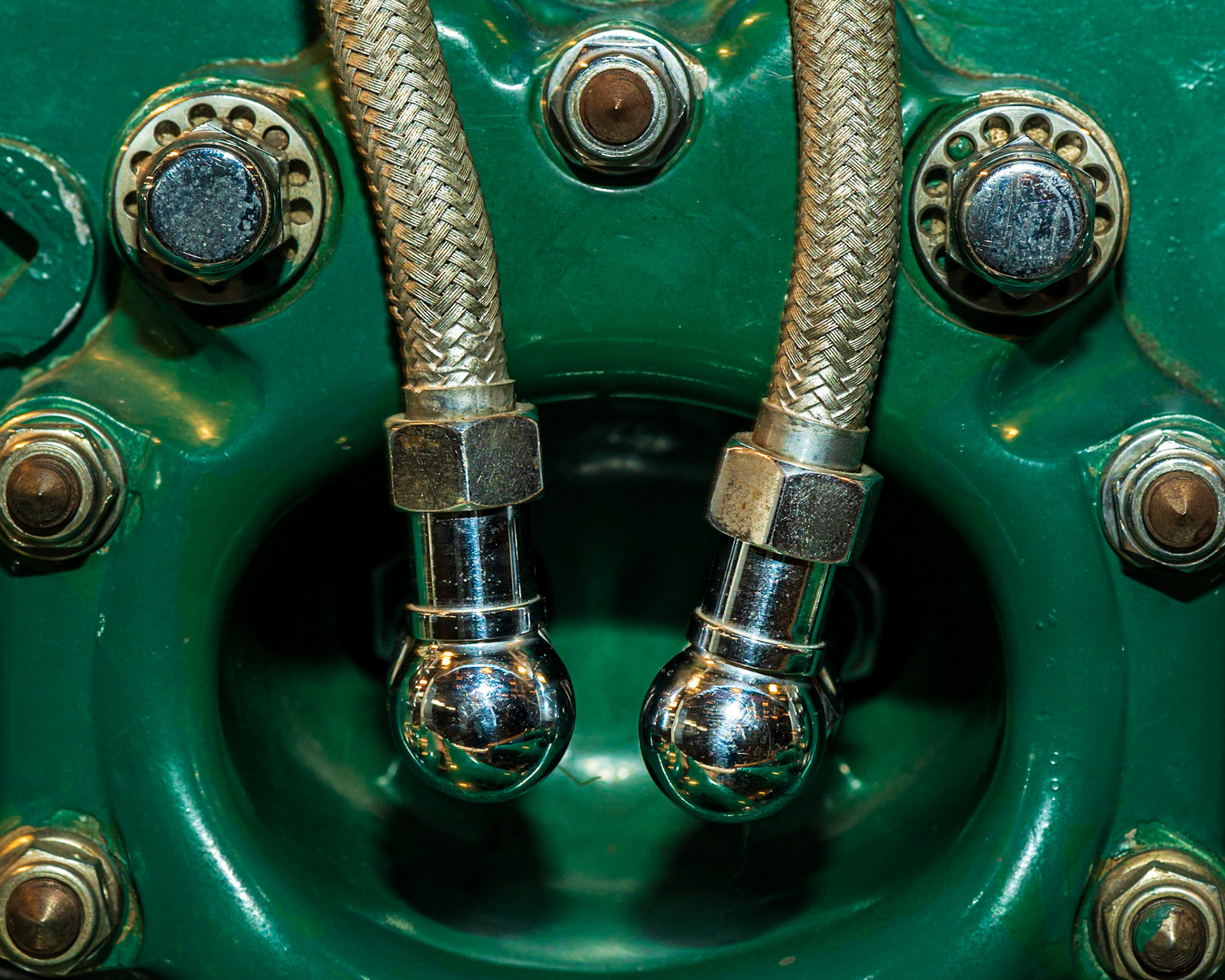 I sought to make the silver spheres the center of interest. They are set within concentric circles of the cavity and surrounding nuts, and the cables serve as leading lines.