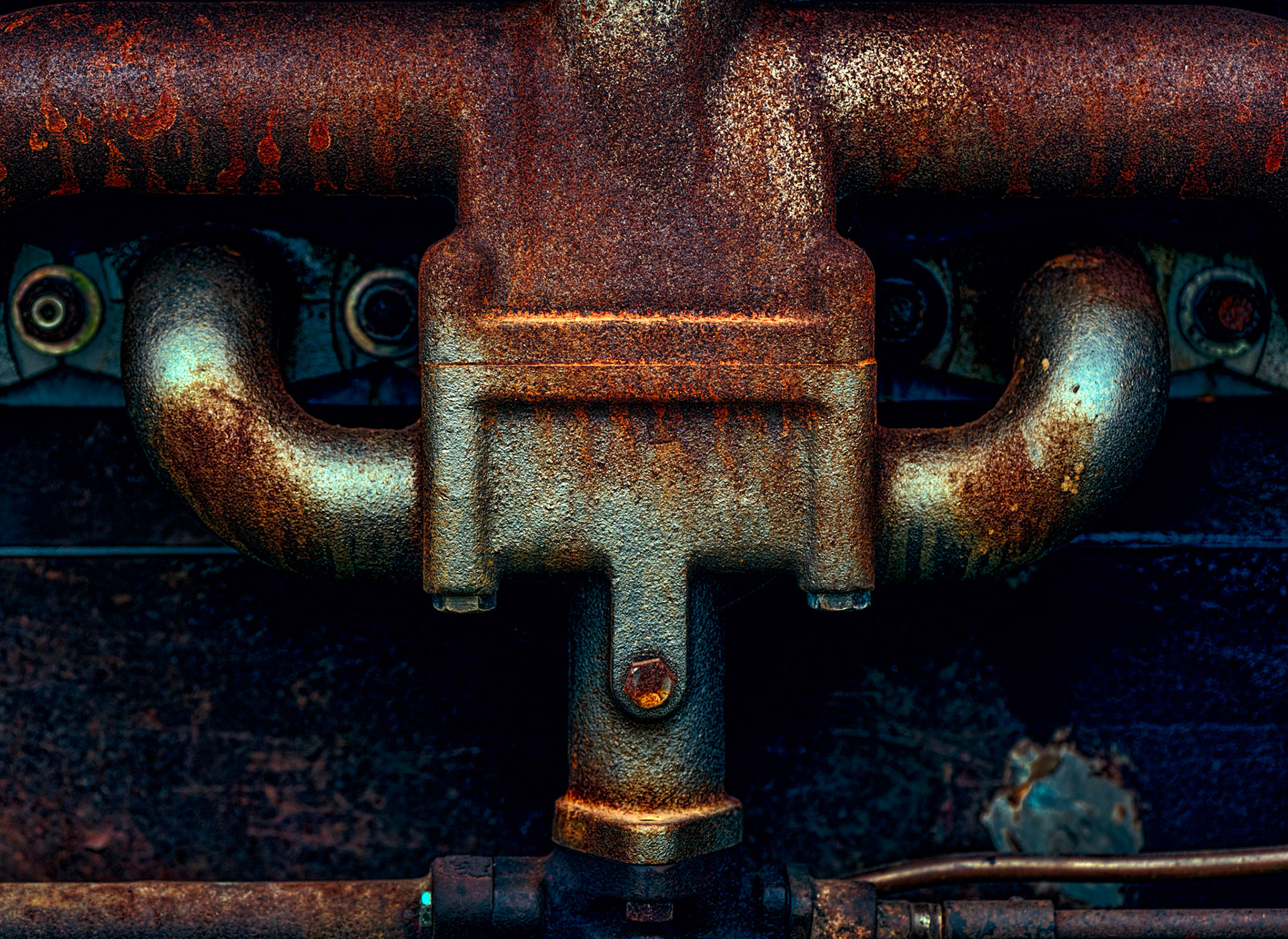 This is a detail from the engine of an old tractor, with enhancements to bring out the texture and colour