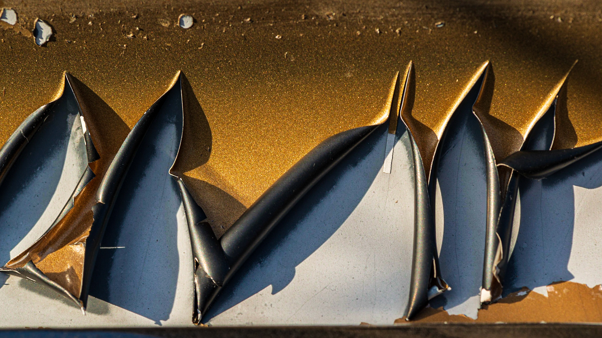 I was very excited when I found this blistered car bumper because it offered so many interesting shapes. My knee pads got a workout on this, and several other photo opportunities.