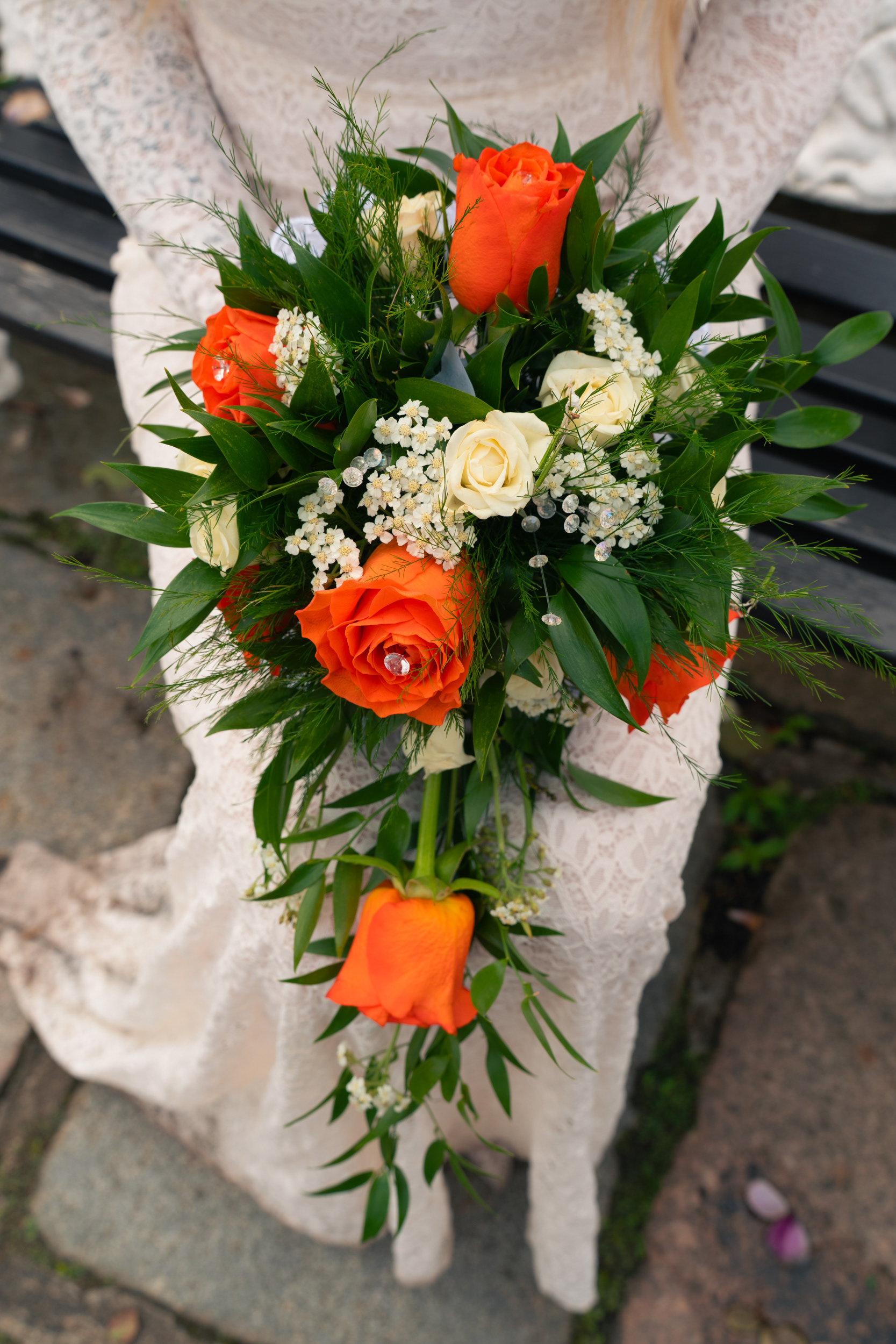 Aberdeen wedding photography: Detail shot of orange and cream bouquet.