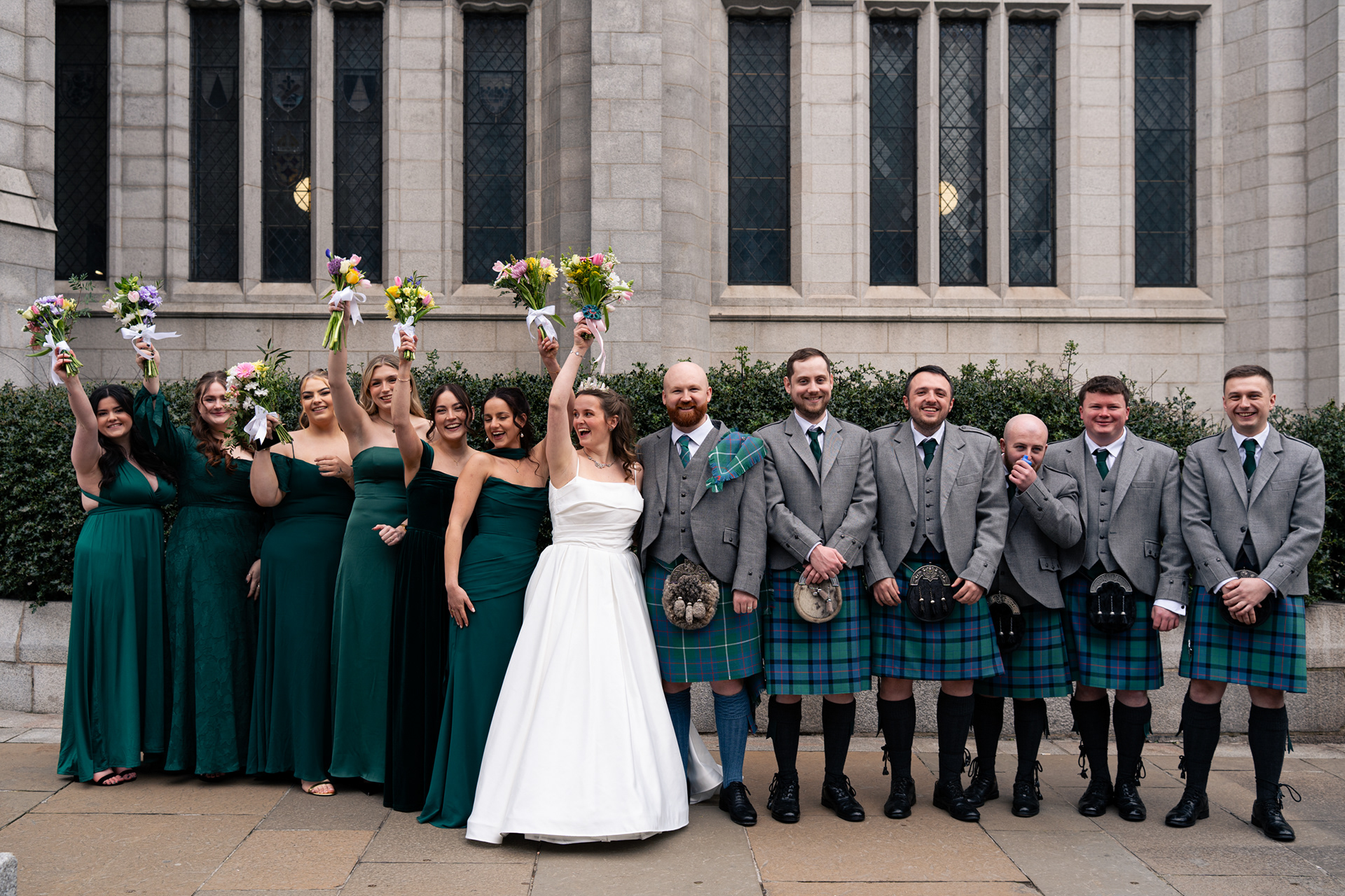 Marischal College wedding: Bride and groom with wedding party.