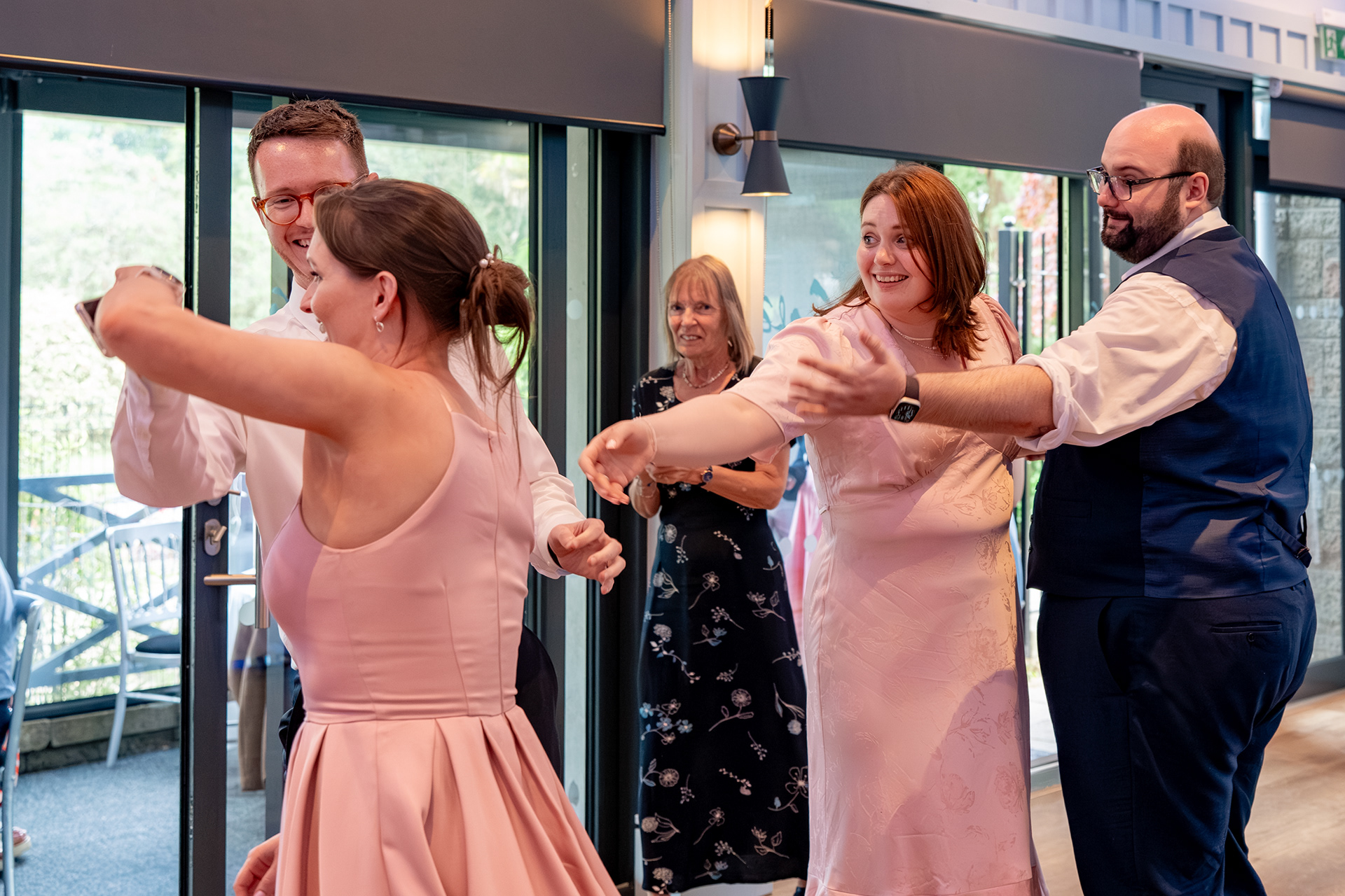 Dancing wedding guests at Aberdeen's Hazlehead Park Cafe