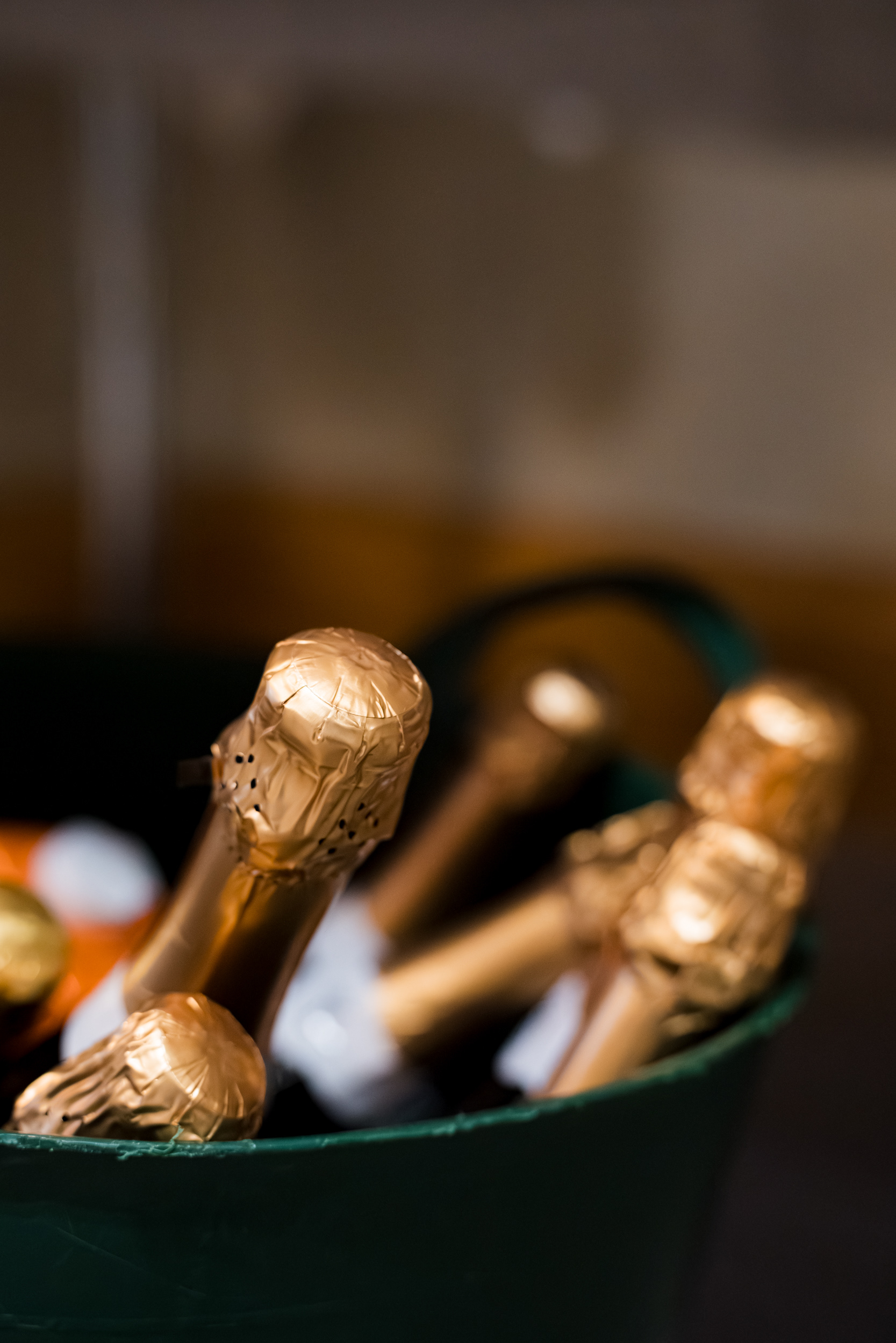 Aberdeen Palm Court wedding: Detail shot of Prosecco bottles waiting to be opened.
