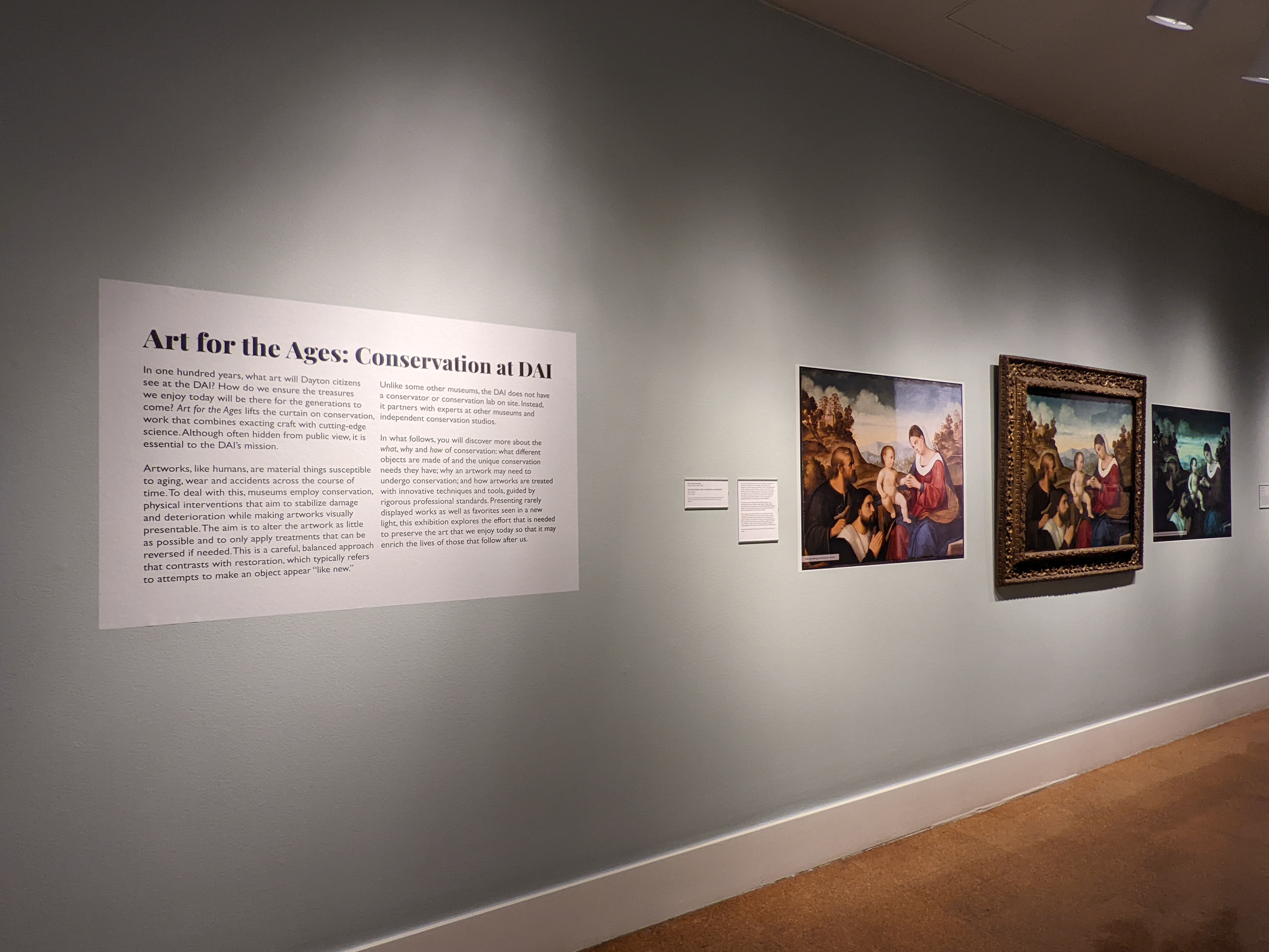 Introductory text panel, next to a featured art work and 2 additional panels that show the conservation process.