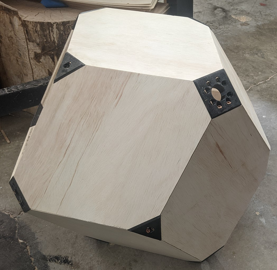 This prototype demonstrated that I could flat pack the design, but it couldn't be taken apart easily because it used screws
