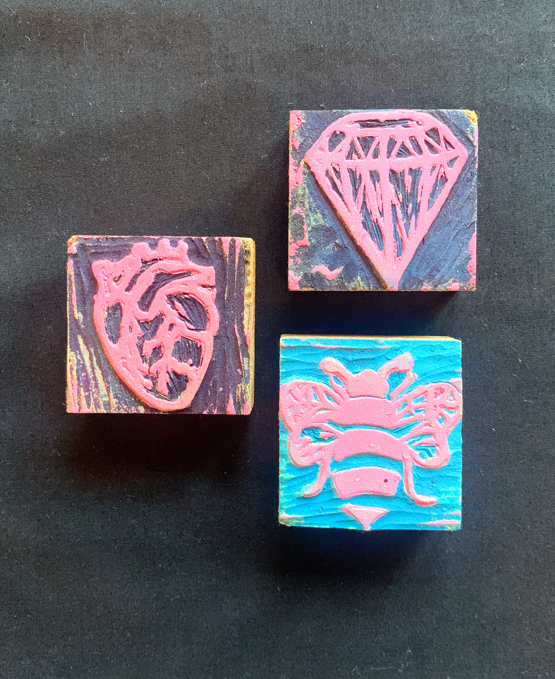 Collection of stamps, heart, bee, and a diamond. 2 x 2 in