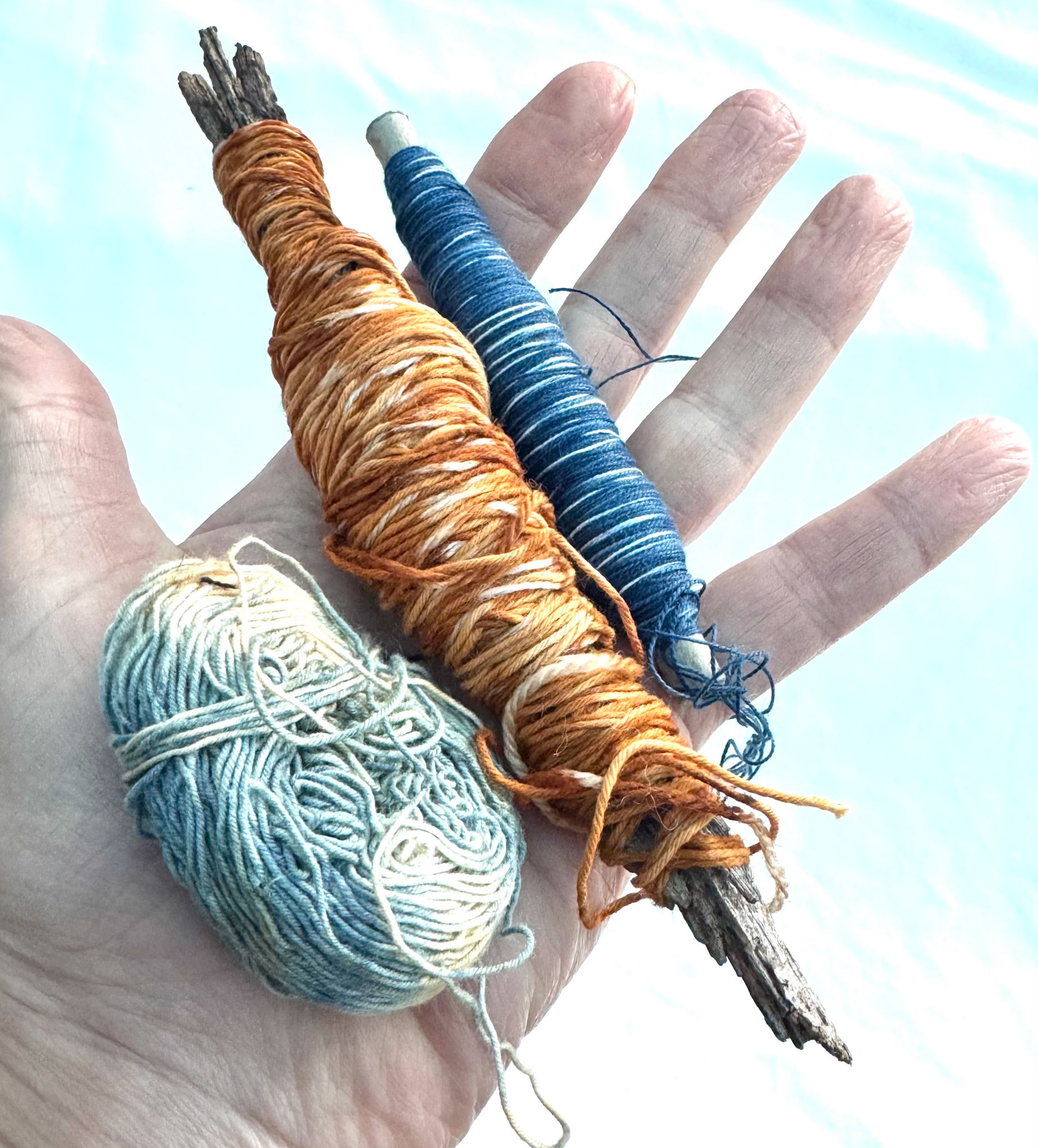 Indigo and rust dyed threads