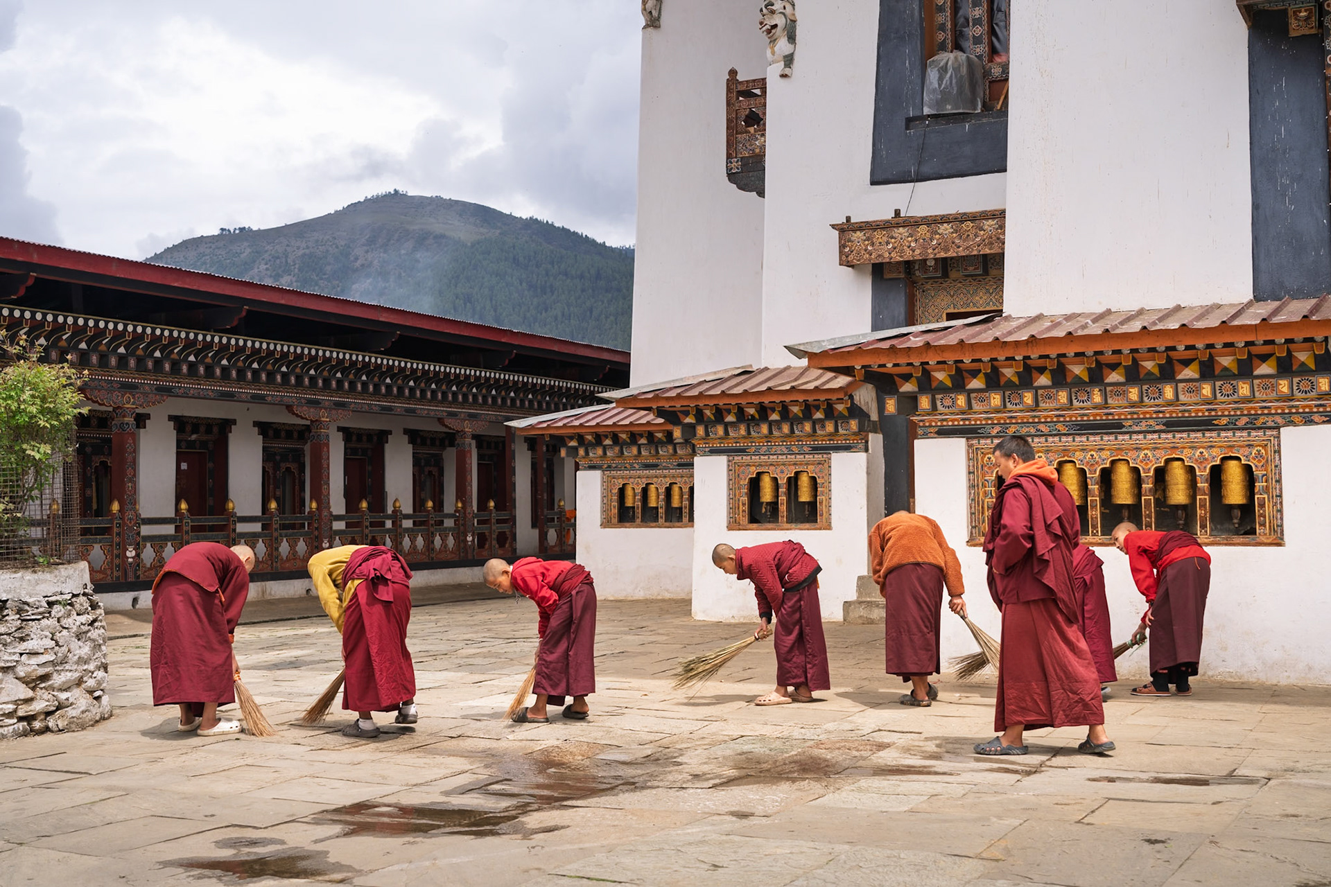 Sweeping Monks at Gangtey Monastery