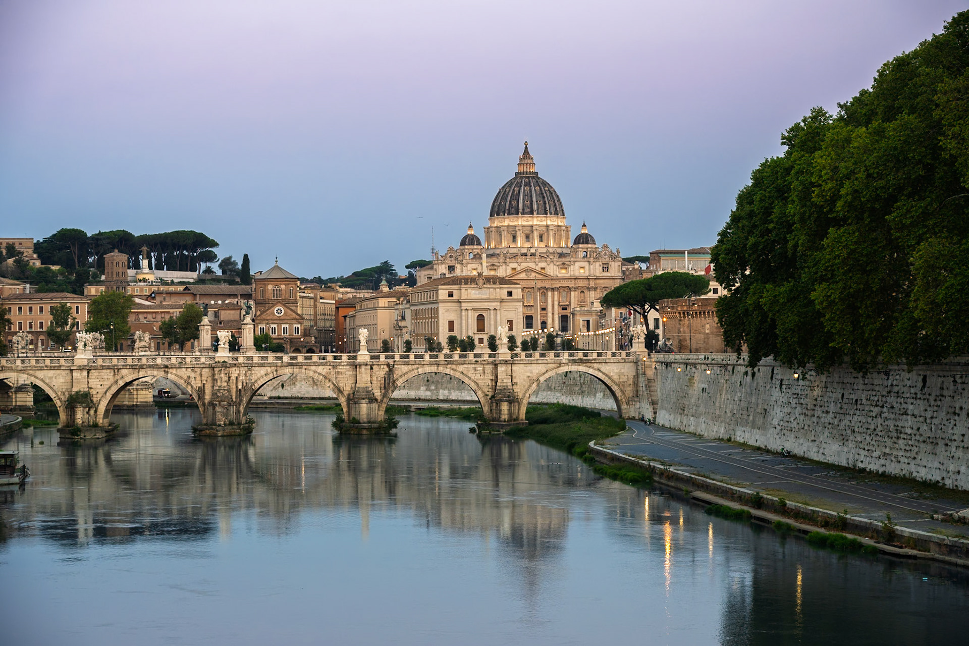 Ponte Umberto over River Tiber with St Peter's Basilica, Rome, Italy