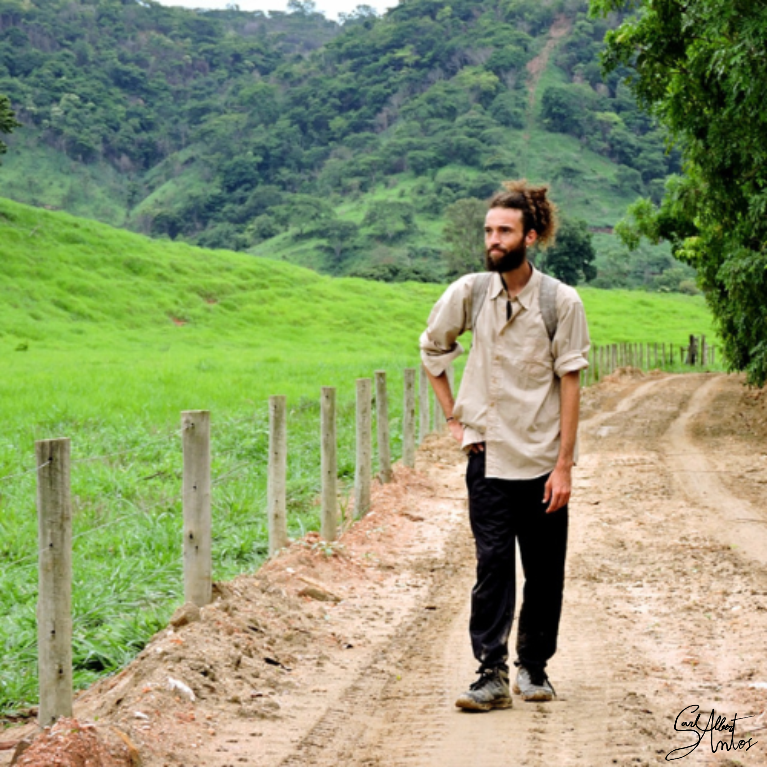 A man walking on a dirt road (shot by Tisha & cut out by Carl)