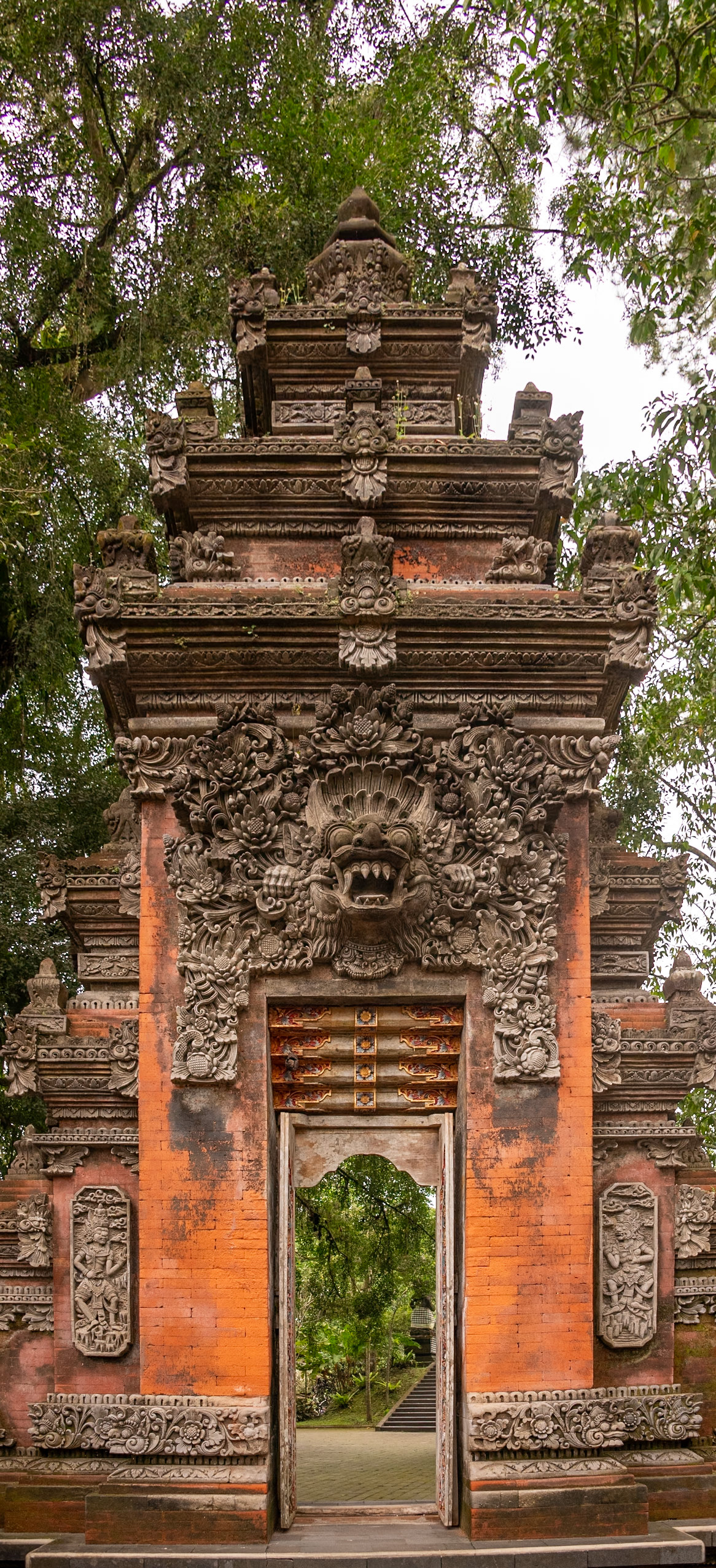 The head of Bhoma is carved at the temple gate which marks the entrance to the holiest part of the shrine