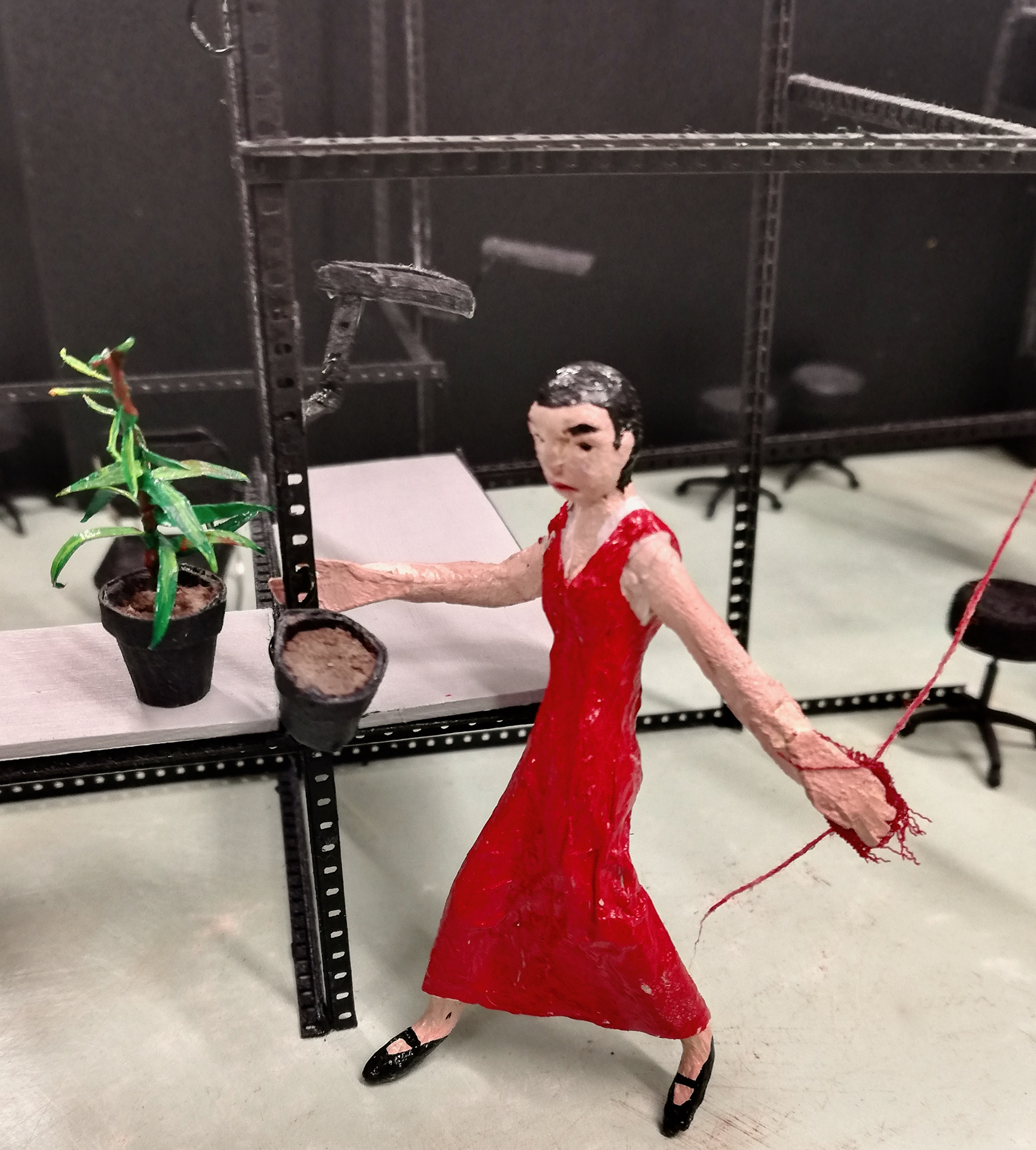 Liuli pulling the red dresses from the fridge