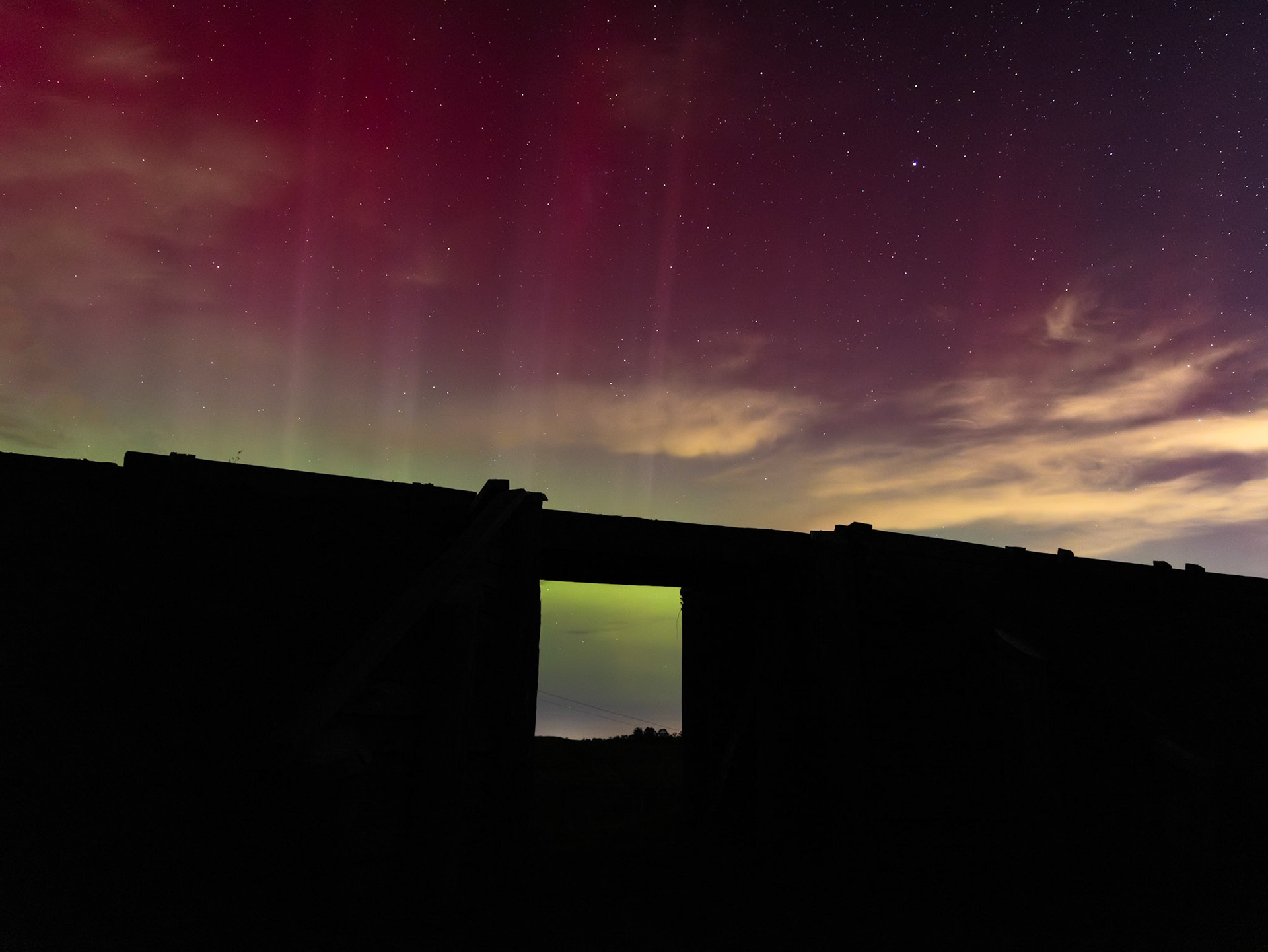 Puffing Billy's Bridge 10, better known as "Farm Bridge", creates a window to the sky as Aurora Australis dances overhead.