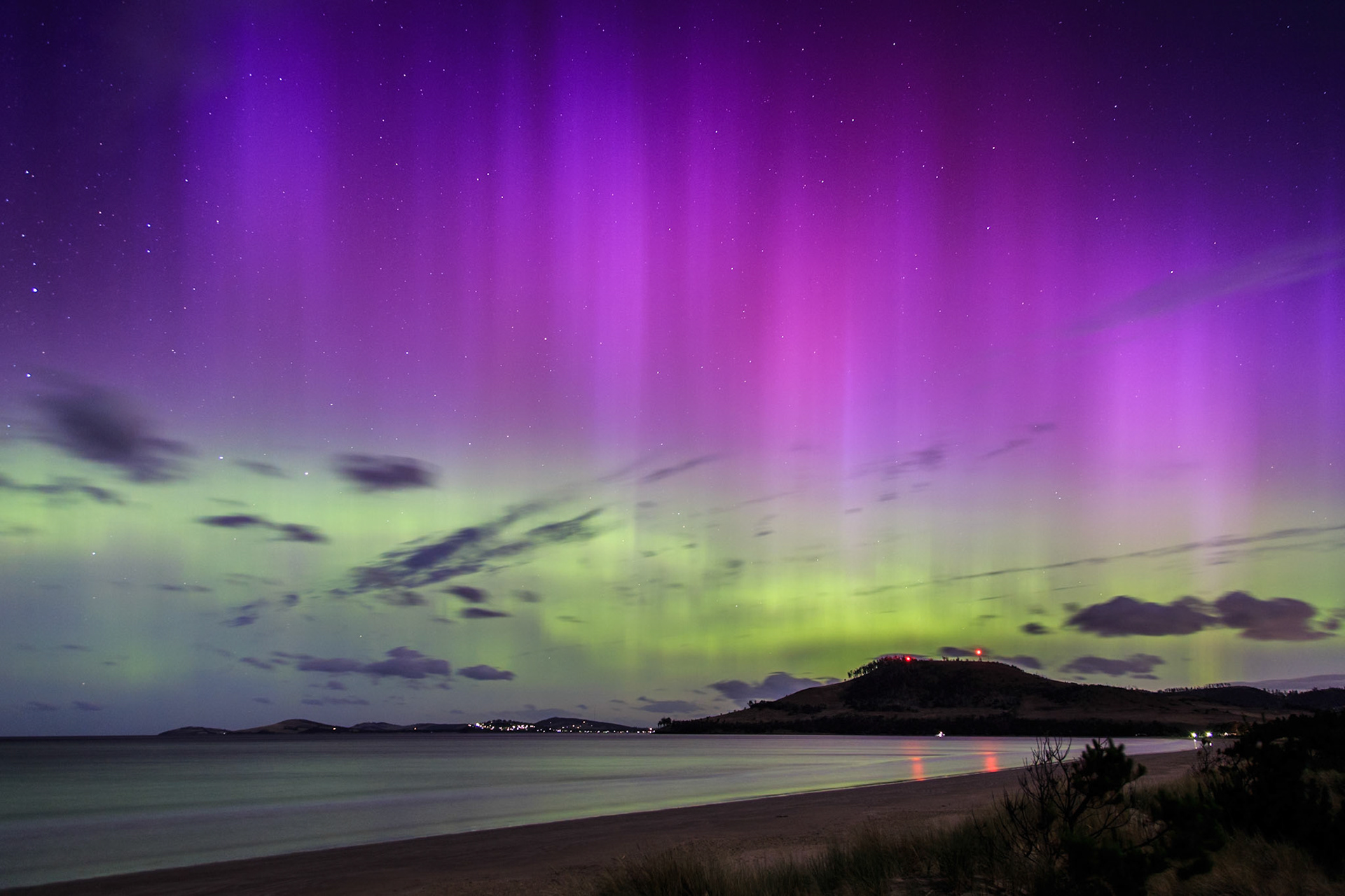 Aurora Australis lights up the night sky over the South Arm, as viewed from Seven Mile Beach. The night of my arrival at Hobart heralded one of the most intense auroral events of the year.