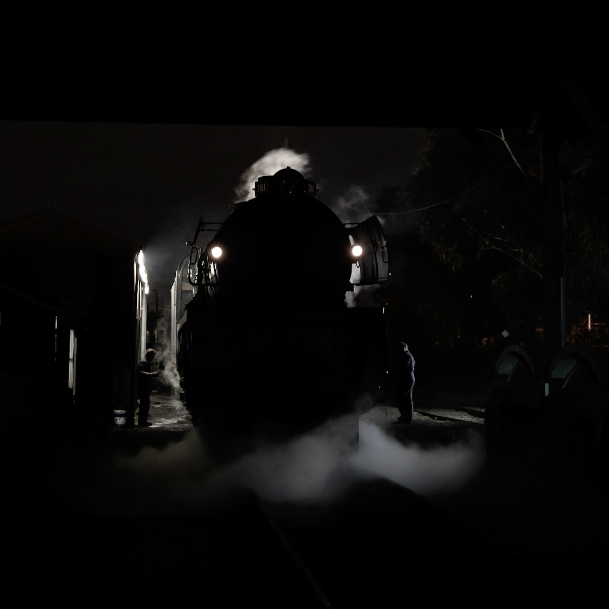 R761's fire has been dropped and the ashpan is being raked out after a jaunt out on the mainline in 2017.