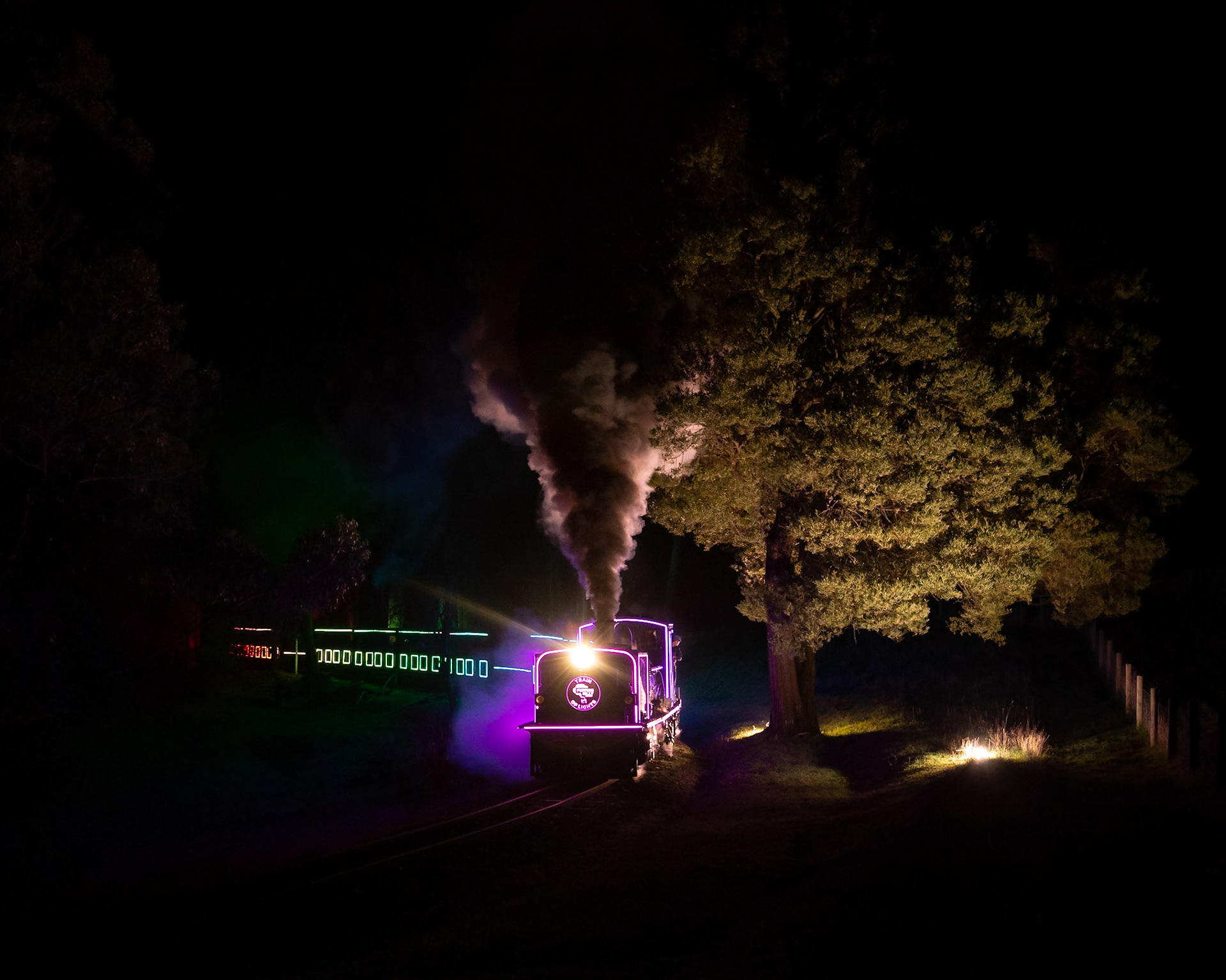 Cracking on with the winter school holidays, Puffing Billy Railway finally launched their "Train of Lights" service from Lakeside through to Gembrook. NG/G16 no. 129 shows off the specially-adapted lighting rigs attached to both the locomotive and the carriages as it roars uphill through Fielder, with a pop of off-camera flash fill to lighten the scene.