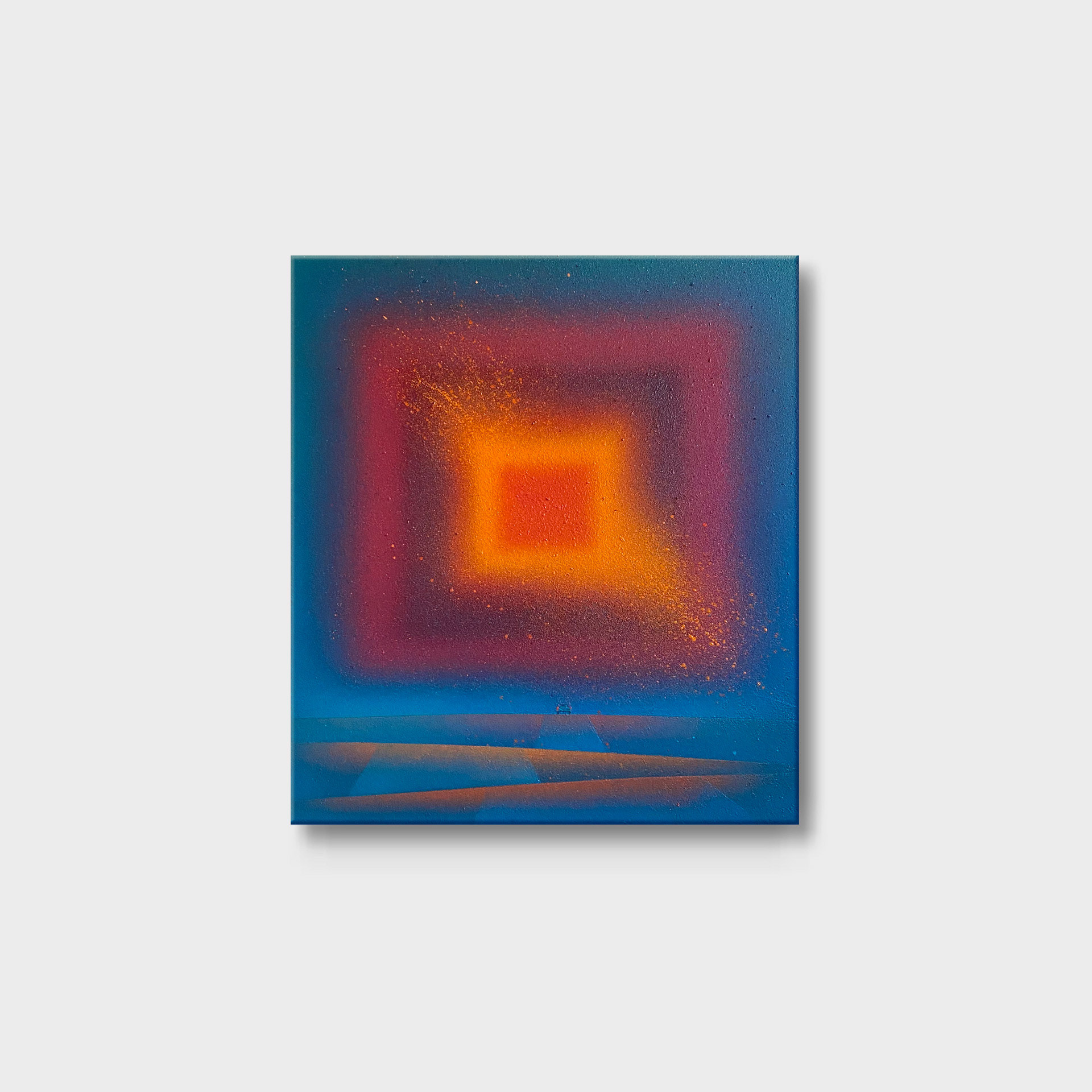 A minimalist abstract oil painting titled "A Spontaneous Trip and a Passing Comet" by Rafał Kapica. The artwork features a vibrant square gradient of orange and crimson erupting with fine splatters over a deep-blue horizon and geometric ridges.