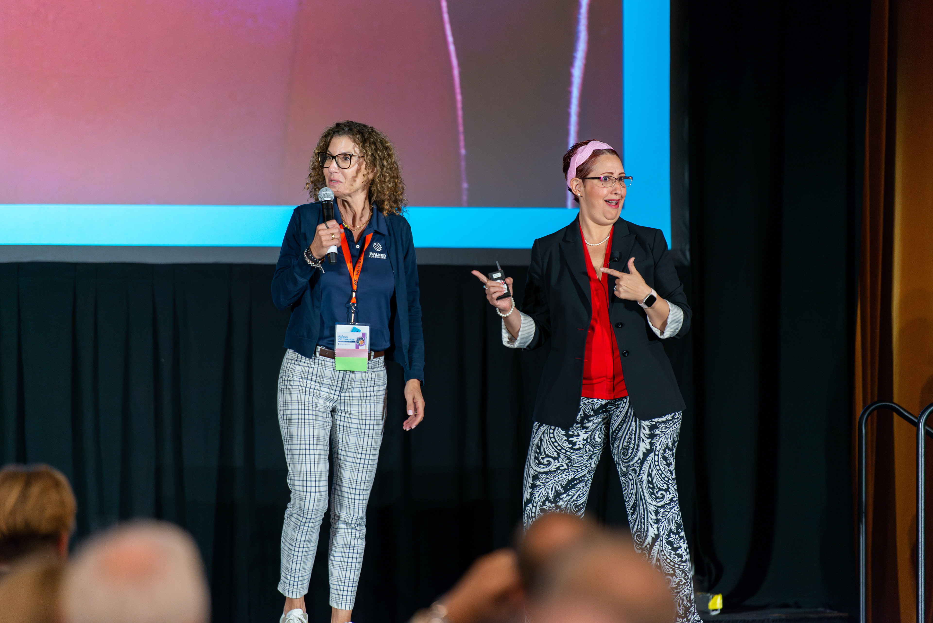 Corporate event photography capturing a speaker live in action