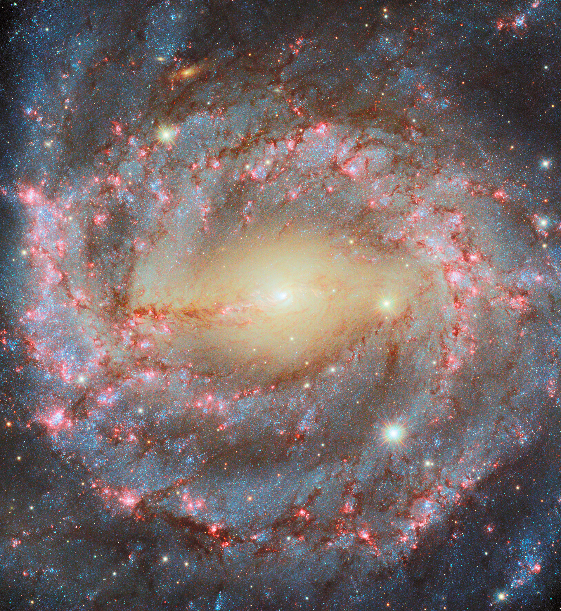 Hubble revisits a grand spiral - Credit: ESA/Hubble & NASA, A. Riess, D. Thilker, D. De Martin (ESA/Hubble), M. Zamani (ESA/Hubble)