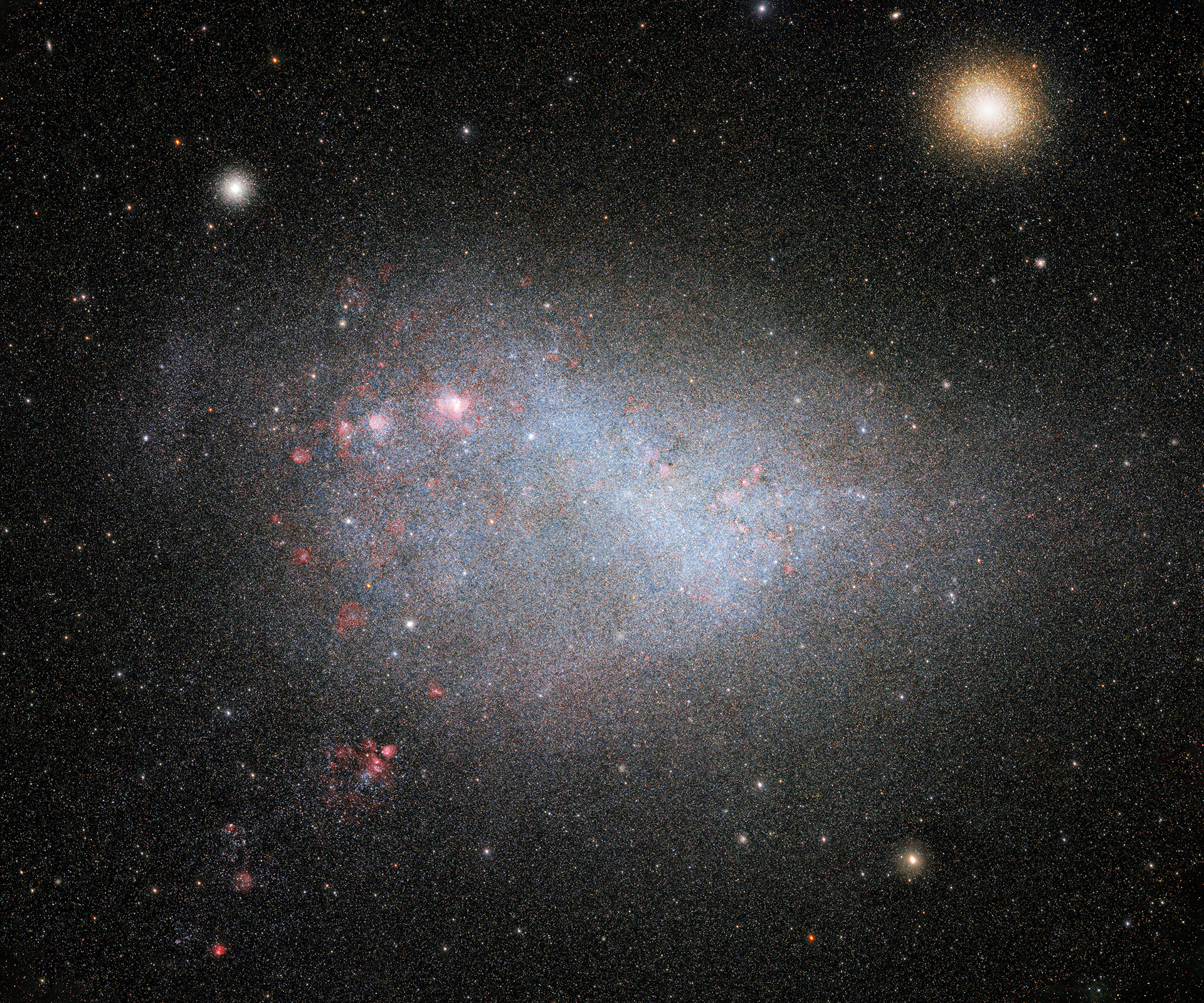 Part of the SMASH dataset showing what is arguably the best wide-angle view of the Small Magellanic Cloud to date. The Large and Small Magellanic Clouds are the largest satellite galaxies of the Milky Way and, unlike the rest of the satellite galaxies, are still actively forming stars — and at a rapid pace.  Credit: CTIO/NOIRLab/NSF/AURA/SMASH/D. Nidever (Montana State University) Acknowledgment: Image processing: Travis Rector (University of Alaska Anchorage), Mahdi Zamani & Davide de Martin