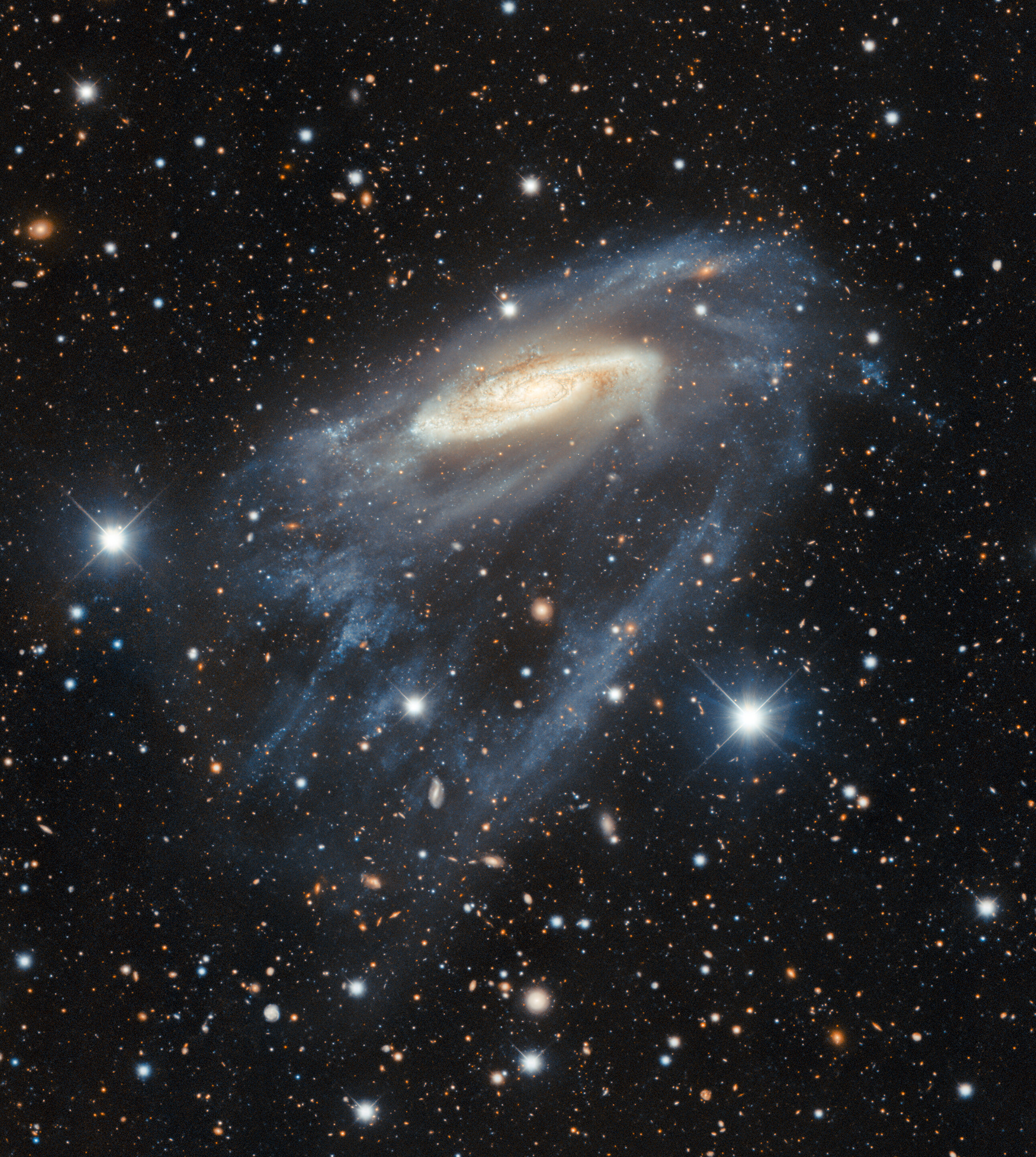 The Unfurling Spiral Arms of NGC 3981 - Credit: Dark Energy Survey/DOE/FNAL/DECam/CTIO/NOIRLab/NSF/AURA Image processing: R. Colombari & M. Zamani (NSF NOIRLab)