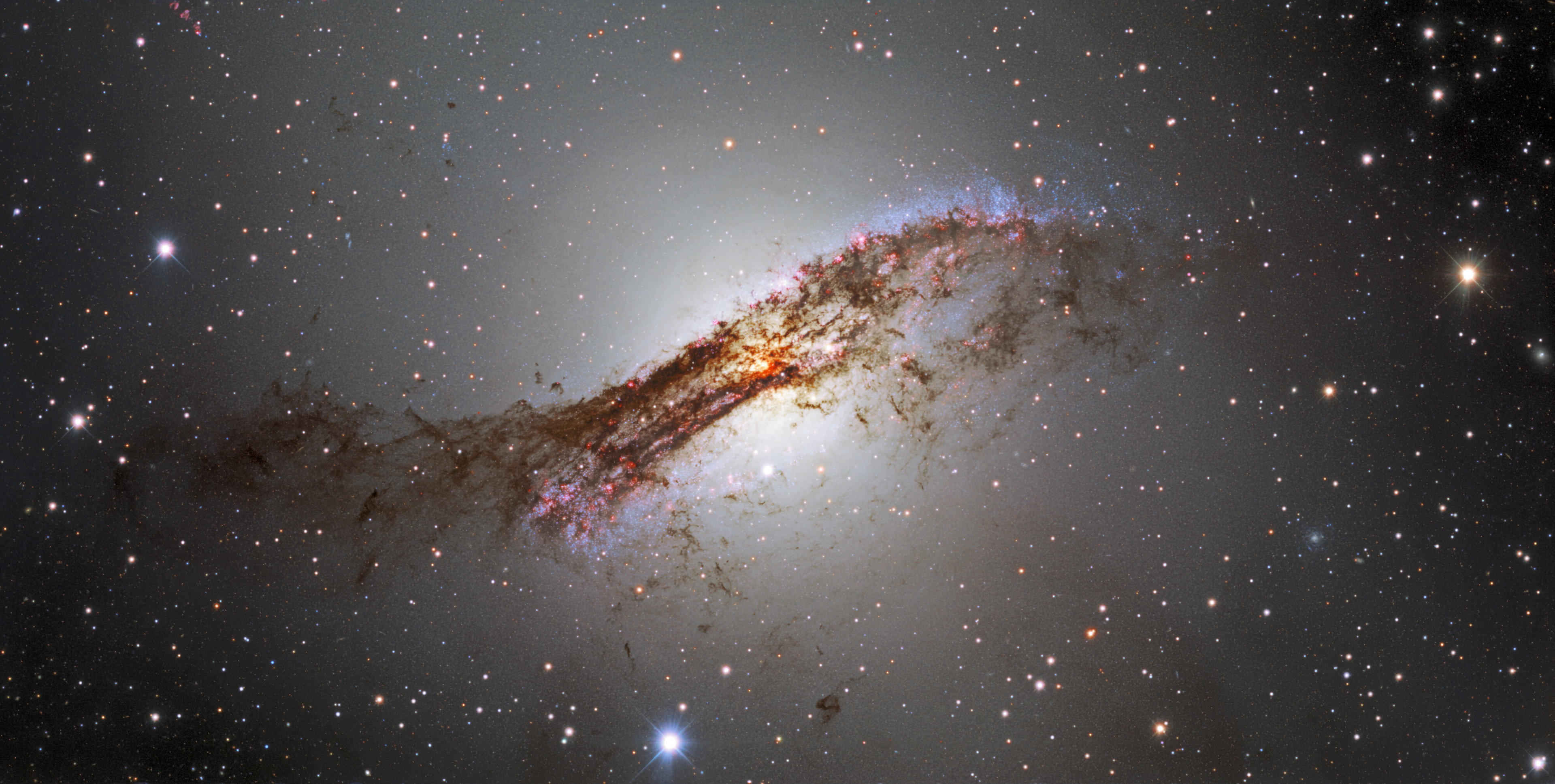 Centaurus A captured by the Dark Energy Camera - Credit: CTIO/NOIRLab/DOE/NSF/AURA  Acknowledgments:  PI: M. Soraisam (University of Illinois at Urbana-Champaign/NSF NOIRLab)  Image processing: T.A. Rector (University of Alaska Anchorage/NSF NOIRLab), M. Zamani (NSF NOIRLab) & D. de Martin (NSF NOIRLab) 