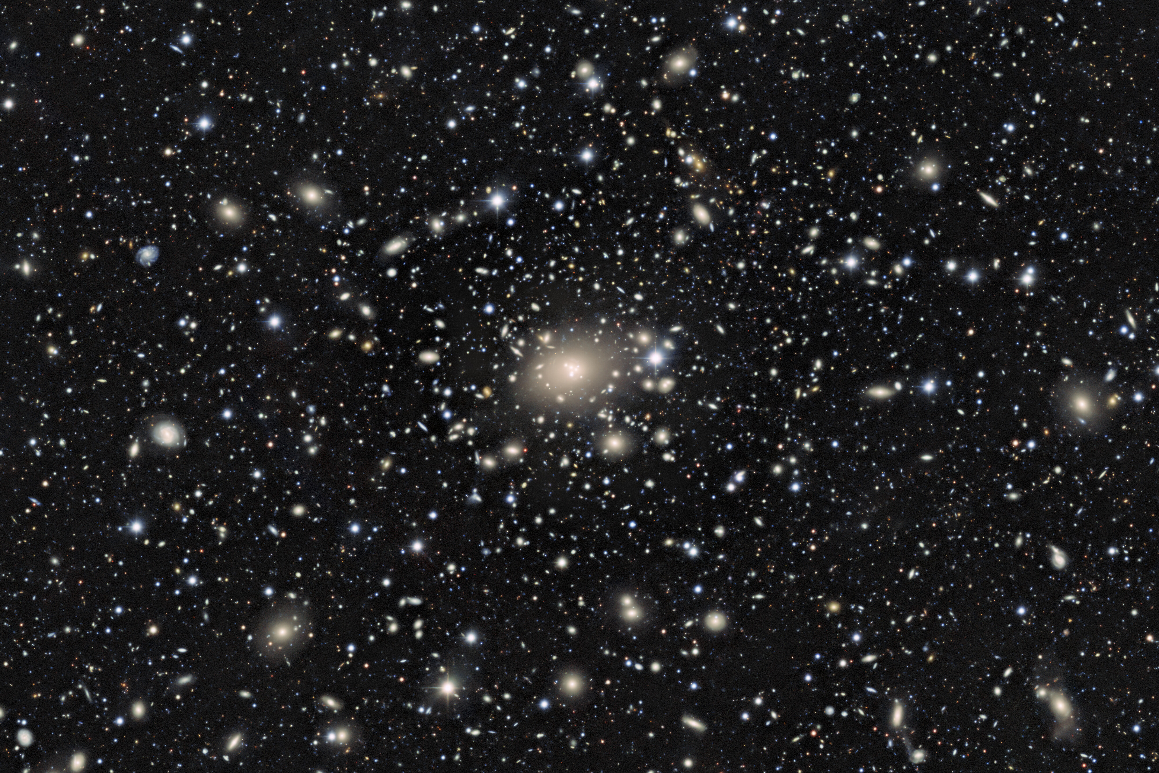 Excerpt of main image without lensing map Excerpt of main image without lensing map LoVoCCS takes advantage of an astrophysical phenomenon called weak gravitational lensing to measure the mass and matter distributions of these clusters.  Credit: CTIO/NOIRLab/NSF/AURA