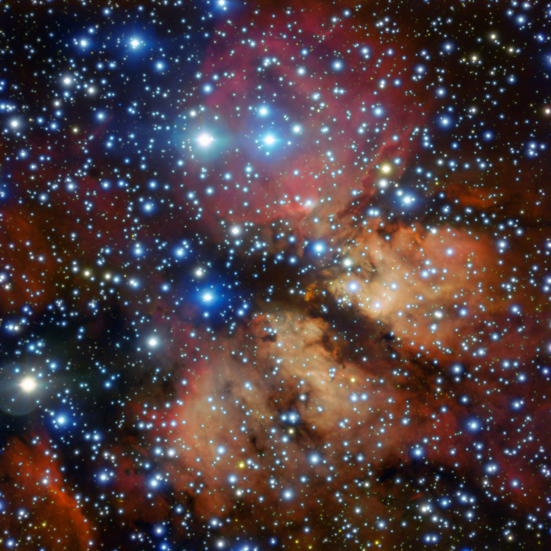 Caught “Pink-Handed” The Milky Way contains many regions of starbirth — areas where new stars are springing to life within collapsing clumps of gas and dust. One such region, named Gum 26, is shown here as imaged by the FORS instrument on ESO’s Very Large Telescope in Chile.  Gum 26 is located roughly 20,000 light-years away in the southern constellation of Vela (The Sails). It is something known as an HII region or  emission nebula, where the intense ultraviolet radiation streaming from newly-formed stars ionises the surrounding hydrogen gas, causing it to emit a faint pinkish glow. By catching new stars “pink-handed” in this manner, astronomers can learn more about the conditions under which stars arise, and study how they influence their cosmic environment.   This image was created as part of the ESO Cosmic Gems programme, an outreach initiative to produce images of interesting, intriguing or visually attractive objects using ESO telescopes, for the purposes of education and public outreach. The programme makes use of telescope time that cannot be used for science observations. All data collected may also be suitable for scientific purposes, and are made available to astronomers through ESO’s science archive.  Credit: ESO