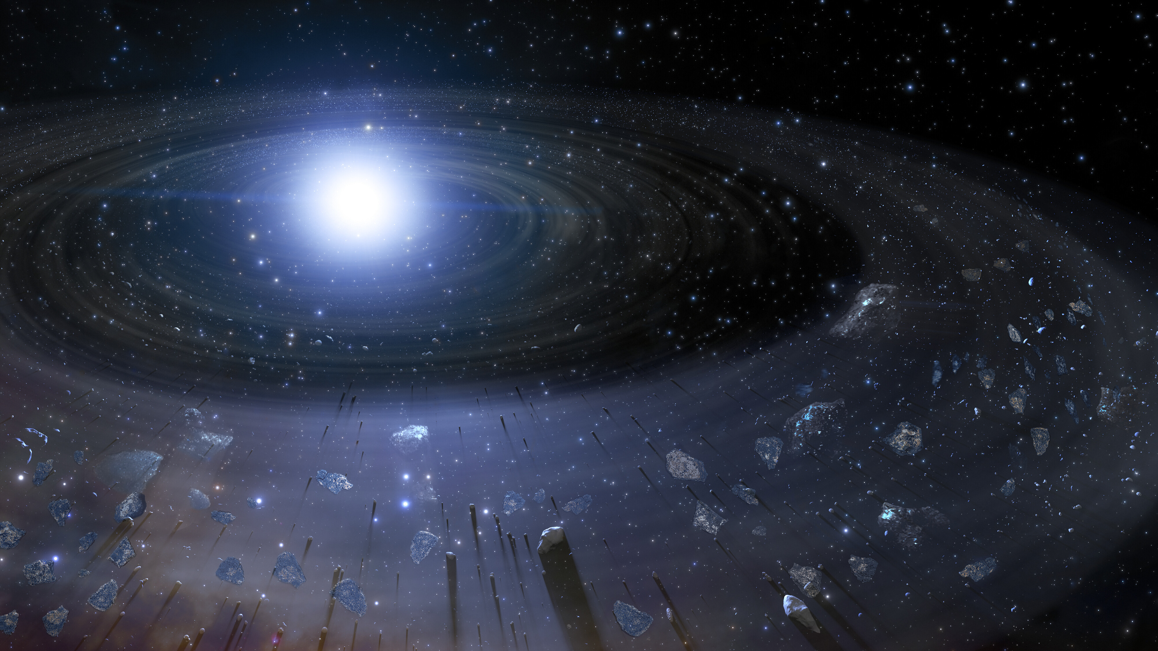 Rocky debris, the pieces of a former rocky planet that has broken up, spiral inward toward a white dwarf in this illustration.  / Credit: NOIRLab/NSF/AURA/J. da Silva   Image processing: Mahdi Zamani and Maral Kosari (NSF NOIRLab)   