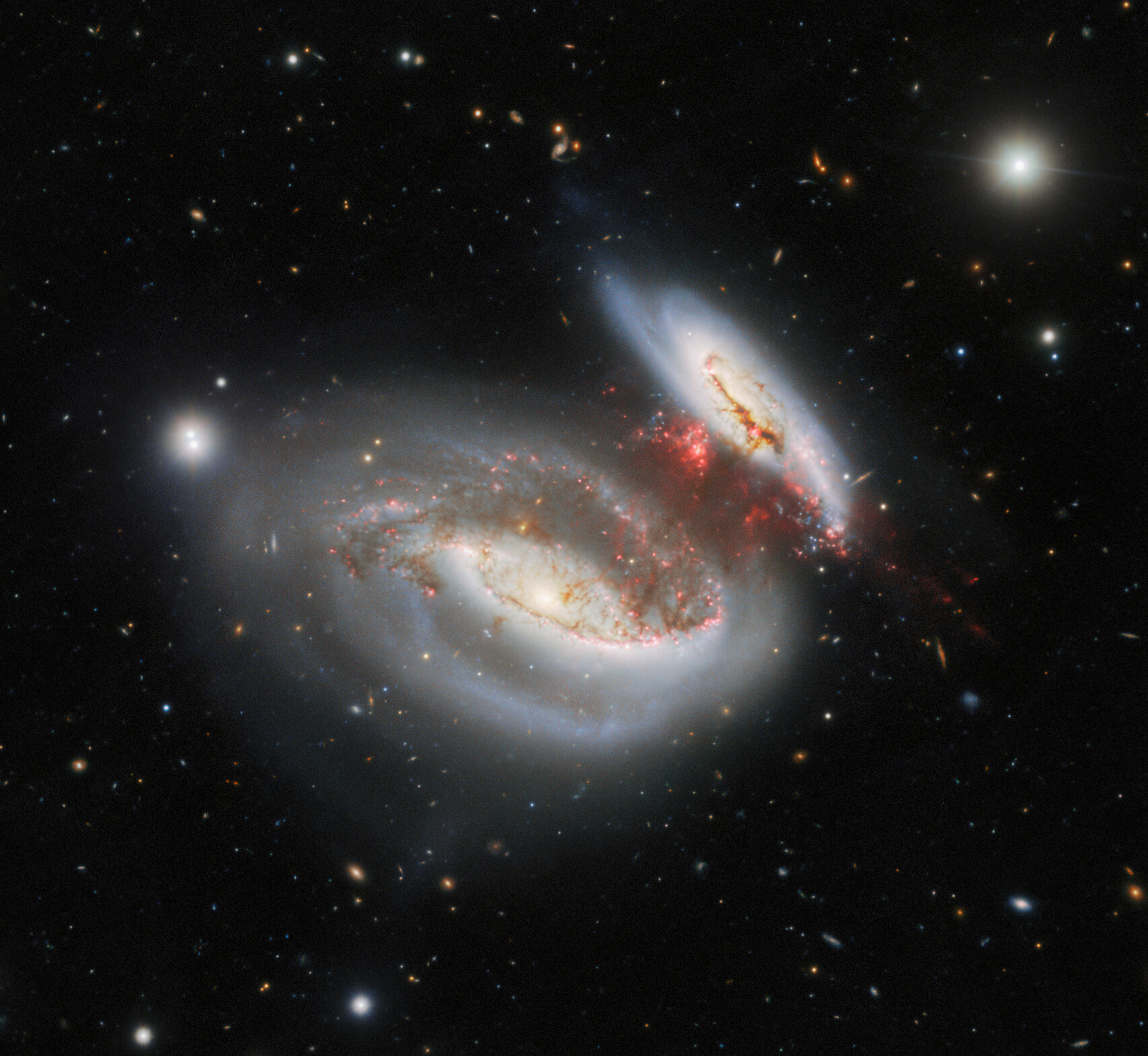 ‘Taffy Galaxies’ Collide, Leave Behind Bridge of Star-Forming Material - Credit: International Gemini Observatory/NOIRLab/NSF/AURA  Image Processing: M. Rodriguez (NSF NOIRLab), T.A. Rector (University of Alaska Anchorage/NSF NOIRLab), J. Miller (Gemini Observatory/NSF NOIRLab), M. Zamani (NSF NOIRLab)  & D. de Martin (NSF NOIRLab)  Acknowledgment: PI: A. S. Castelli  (Universidad Nacional de la Plata)